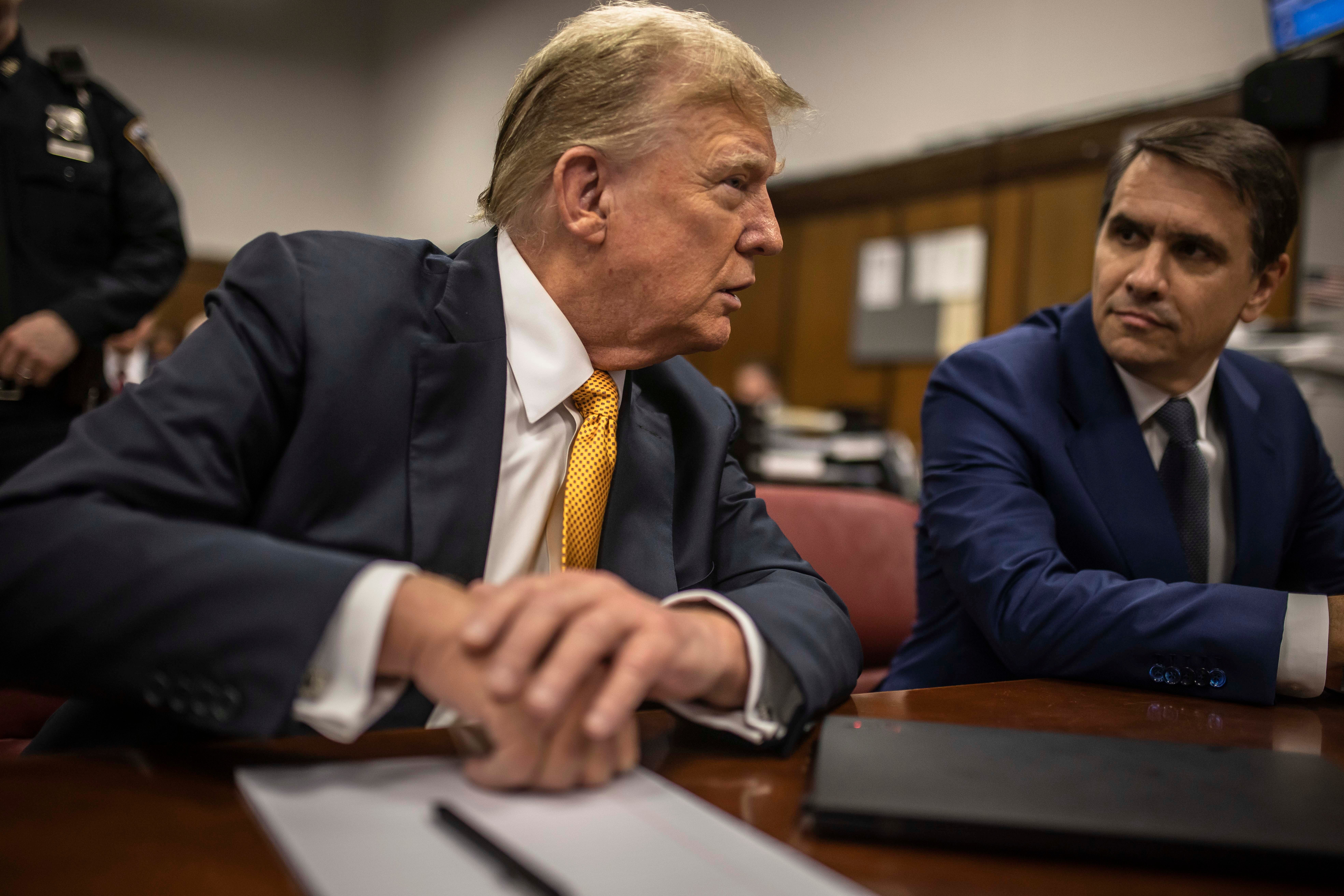 Former President Donald Trump sits in the courtroom next to his lawyer Todd Blanche shortly before the defense rested its case on Tuesday May 21