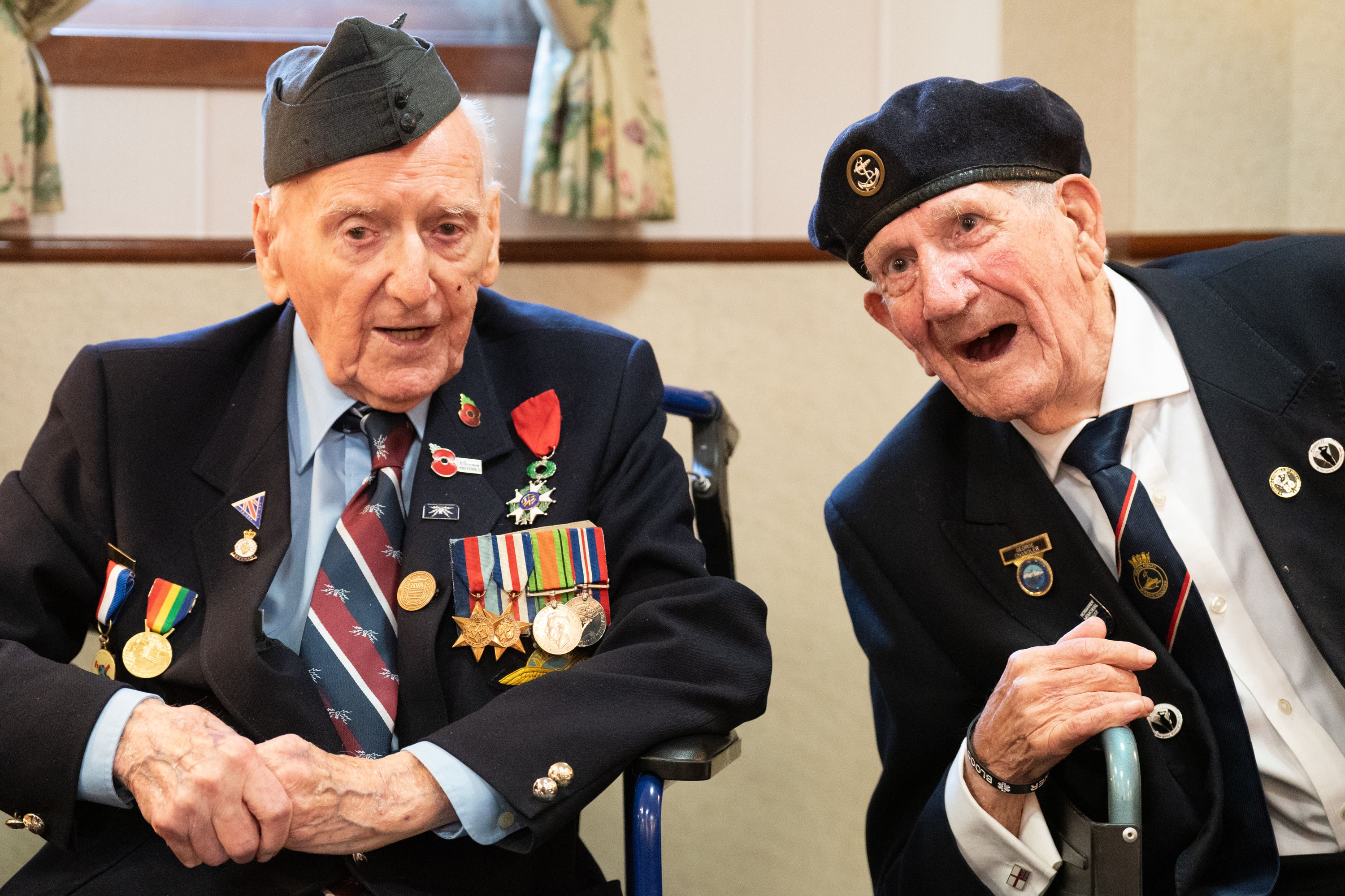 George Chandler, 99, right, told pupils at an event on board HMS Belfast that there was ‘nothing grand’ about war (Stefan Rousseau/PA)