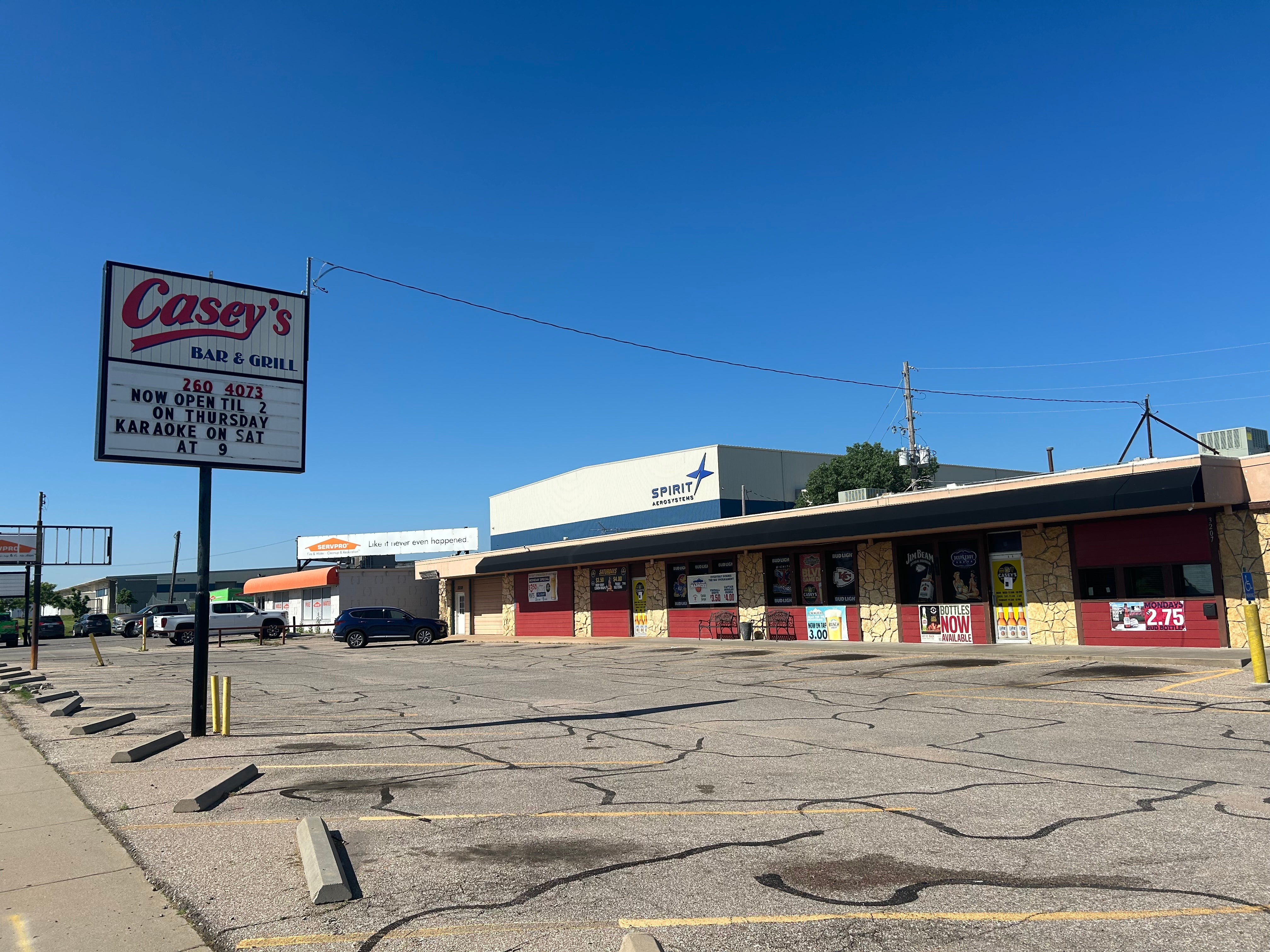 Casey’s Bar and Grill in Wichita stands at the edge of the Spirit AeroSystems site and is popular with workers; the watering hole was uncharacteristically quiet last Thursday, the day news broke of upcoming layoffs as a celebration of life was held a a nearby church for former Spirit auditor and whistleblower Joshua Dean