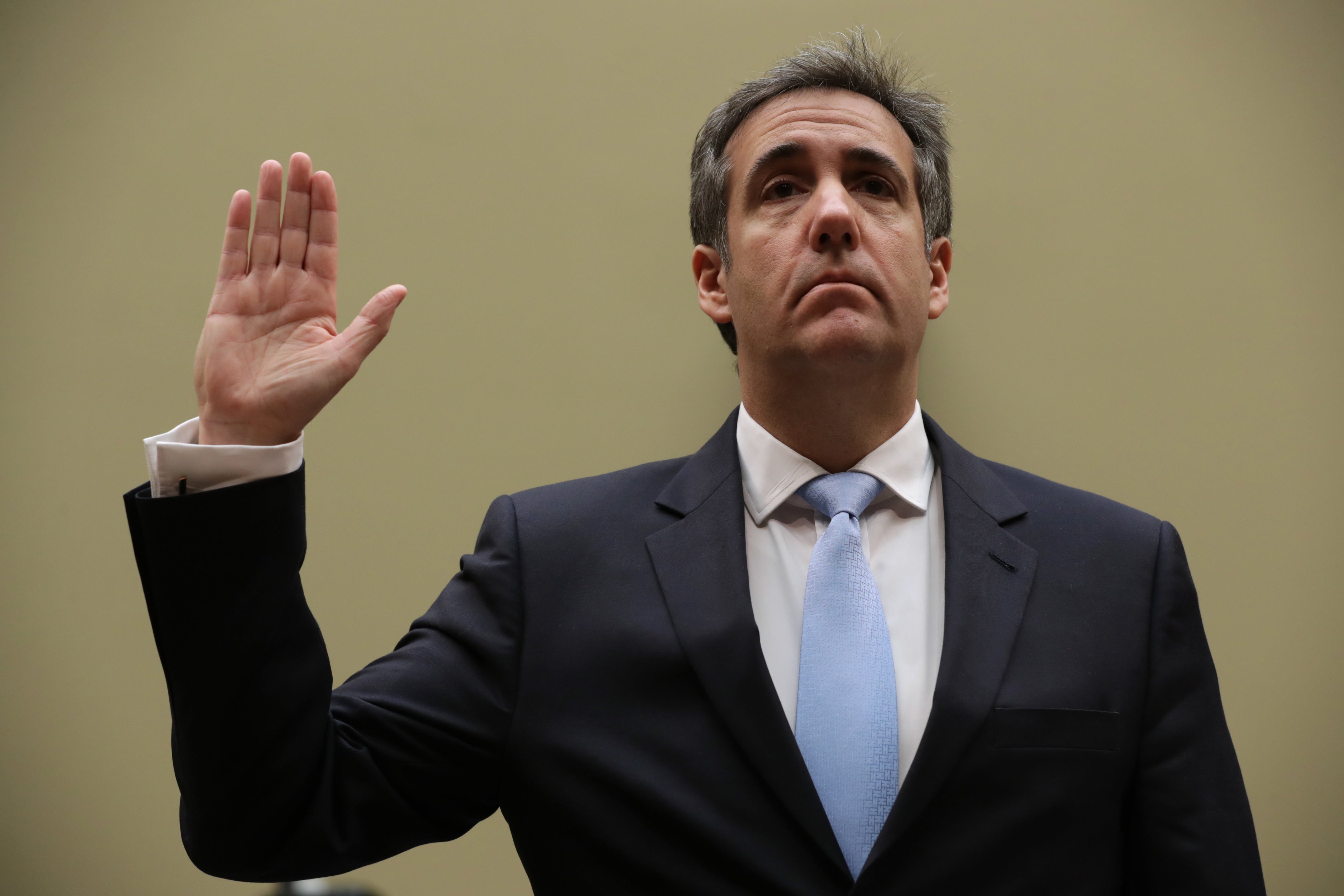 Michael Cohen, former attorney and fixer for President Donald Trump is sworn in before testifying before the House Oversight Committee on Capitol Hill February 27, 2019