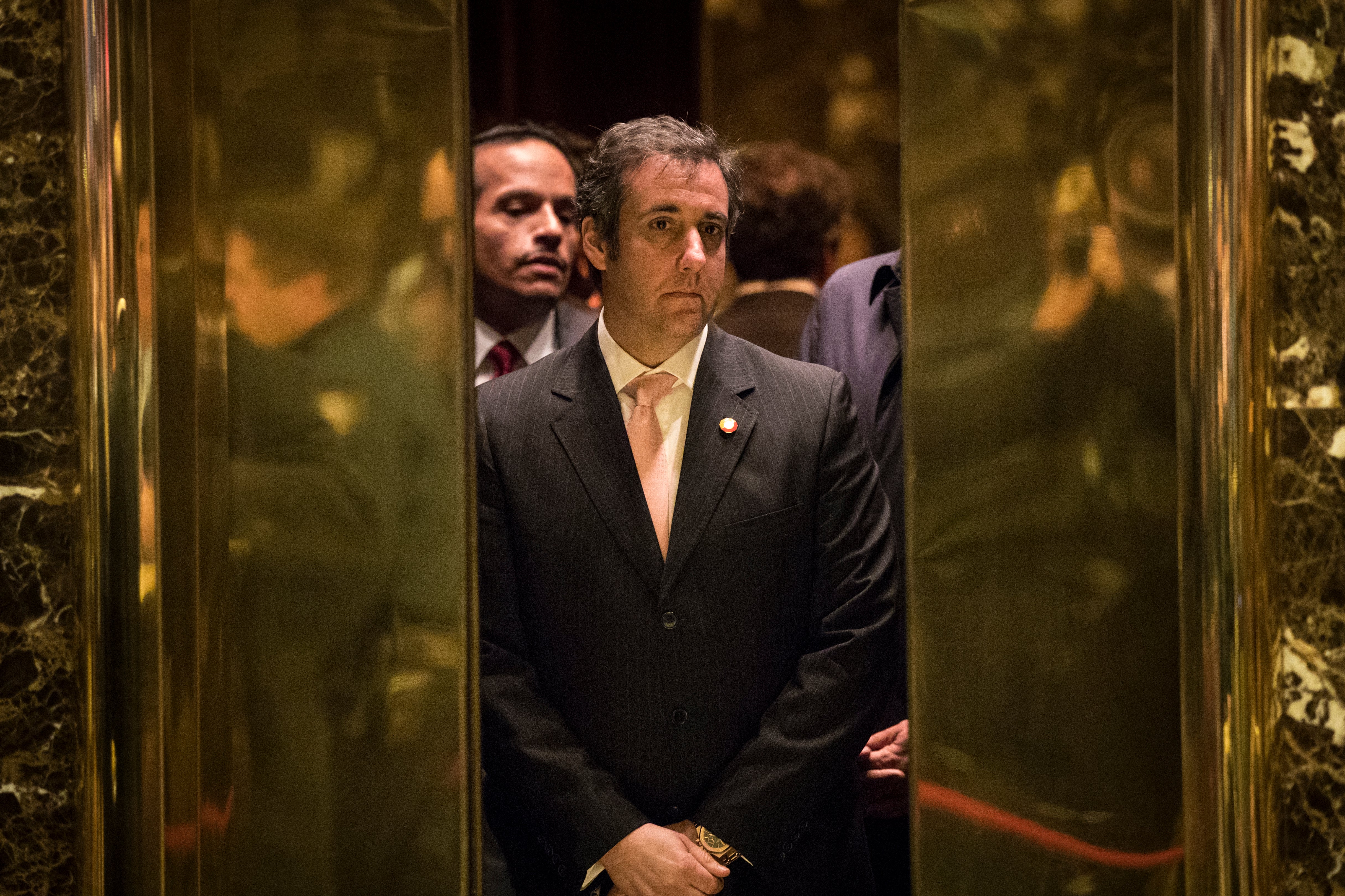 Michael Cohen, personal lawyer for President-elect Donald Trump, gets into an elevator at Trump Tower, December 12, 2016