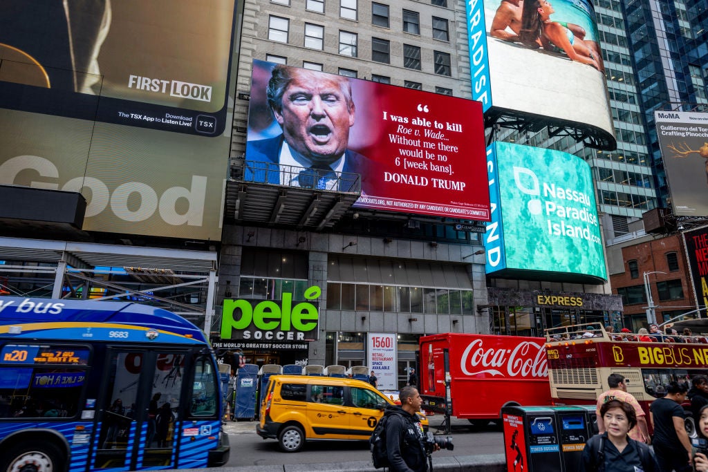 A billboard displaying Donald Trump’s boastful remarks about his responsibility for overturning Roe vs Wade is displayed in Times Square