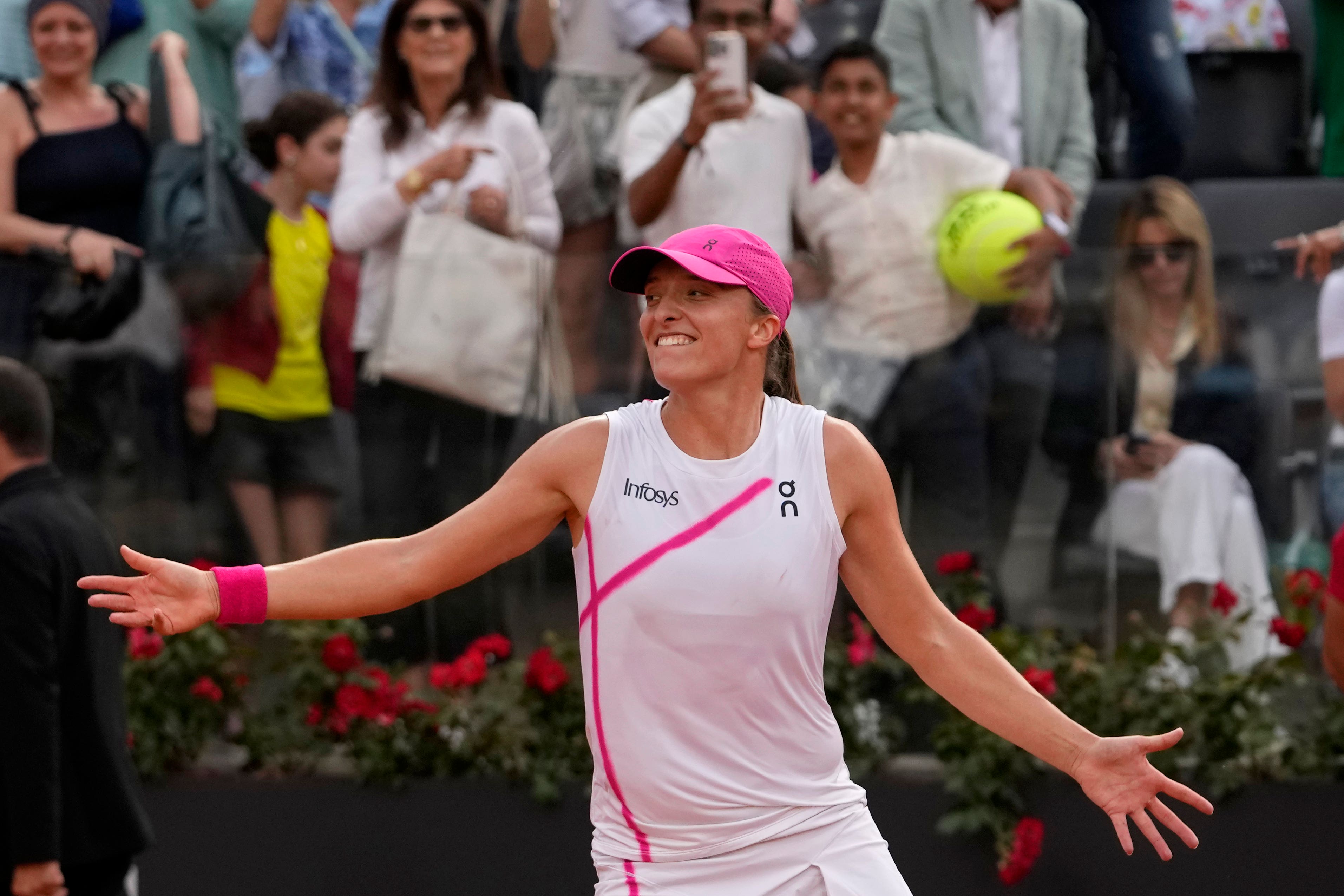 Iga Swiatek will be looking to add to her growing trophy collection at the French Open (Alessandra Tarantino/AP)