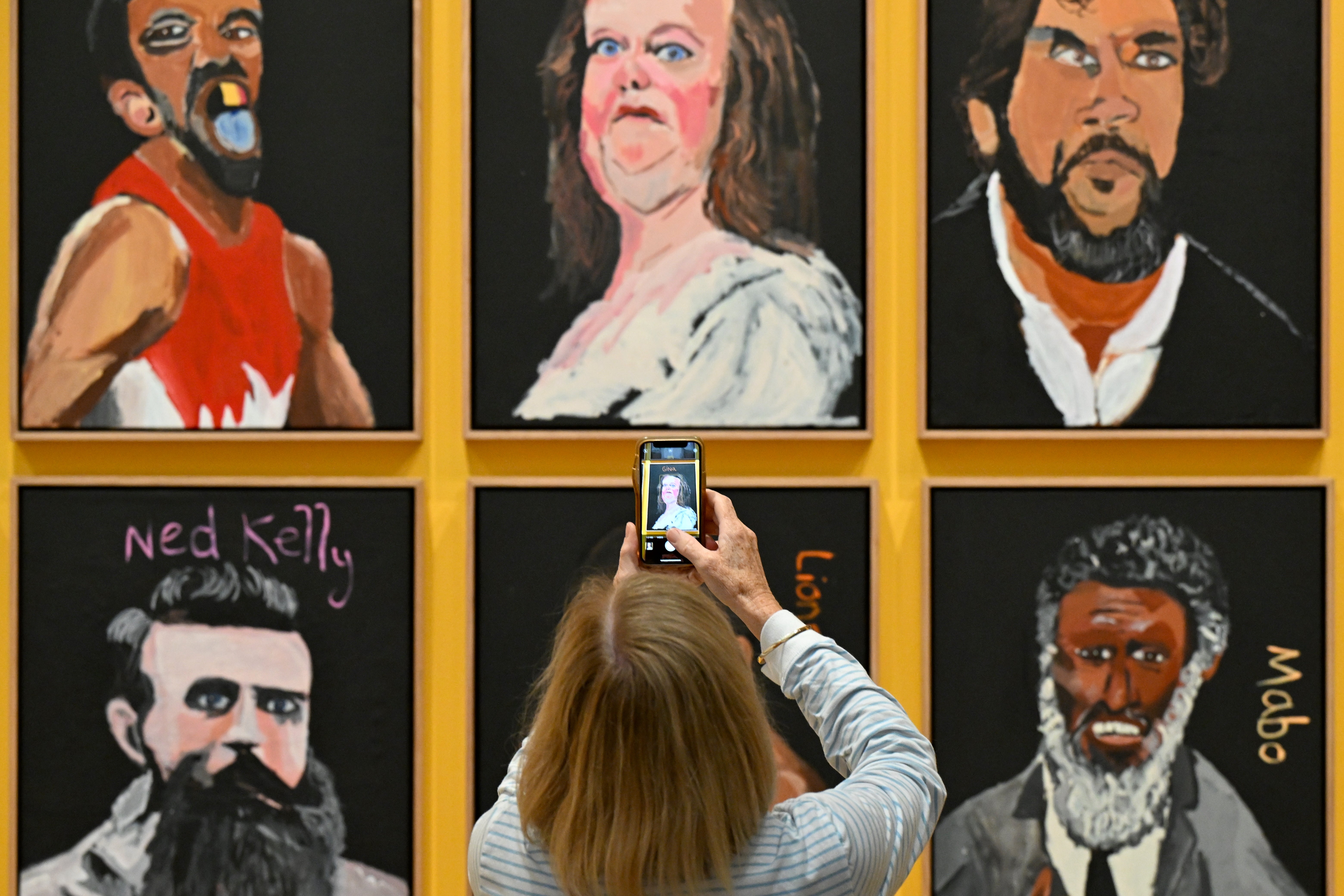 Australian billionaire Gina Rinehart’s portrait by artist Vincent Namatjira is displayed at the National Gallery of Australia in Canberra