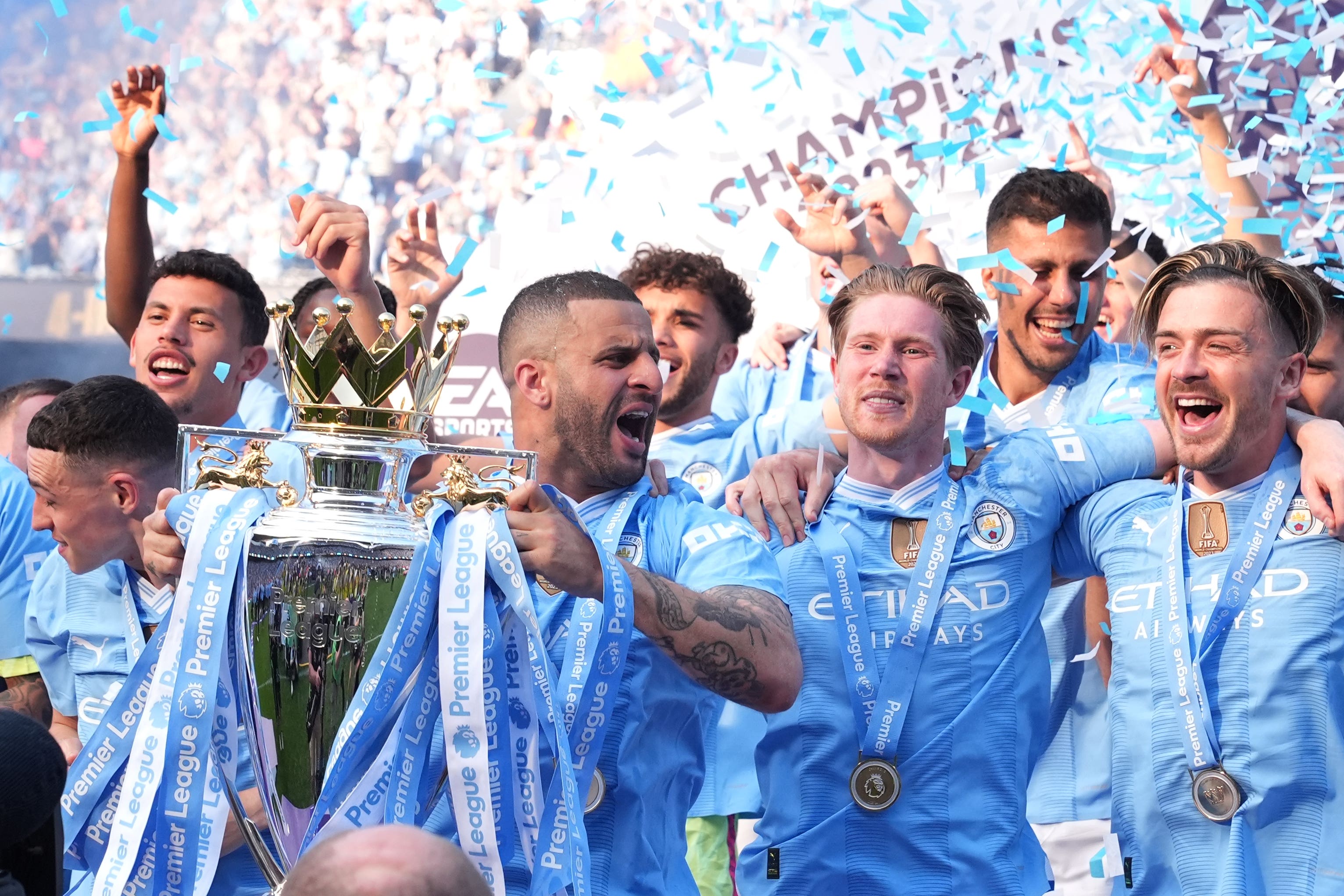 Manchester City’s Kyle Walker lifts the Premier League trophy (Martin Rickett/PA)