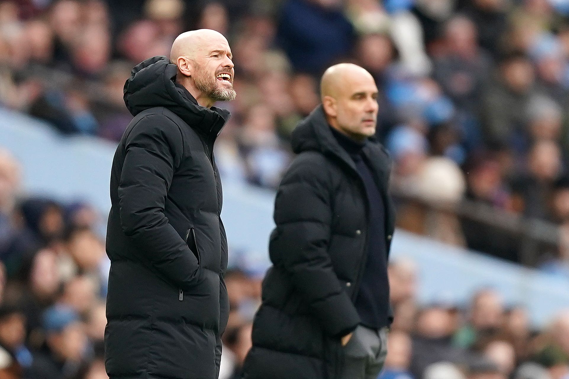 Erik ten Hag and Pep Guardiola go head to head on Saturday (Mike Egerton/PA)