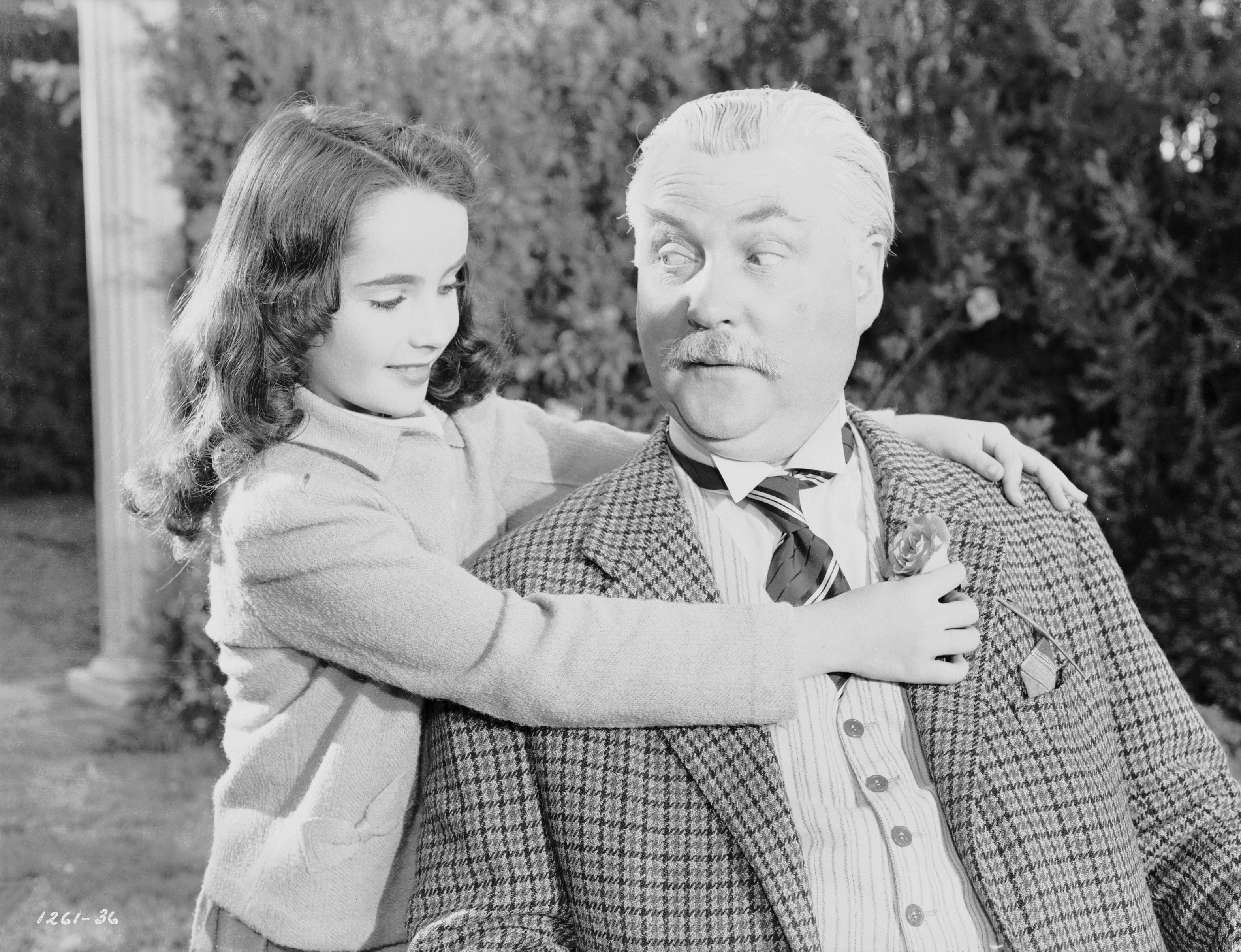 A young Taylor alongside Nigel Bruce in ‘Lassie Come Home'