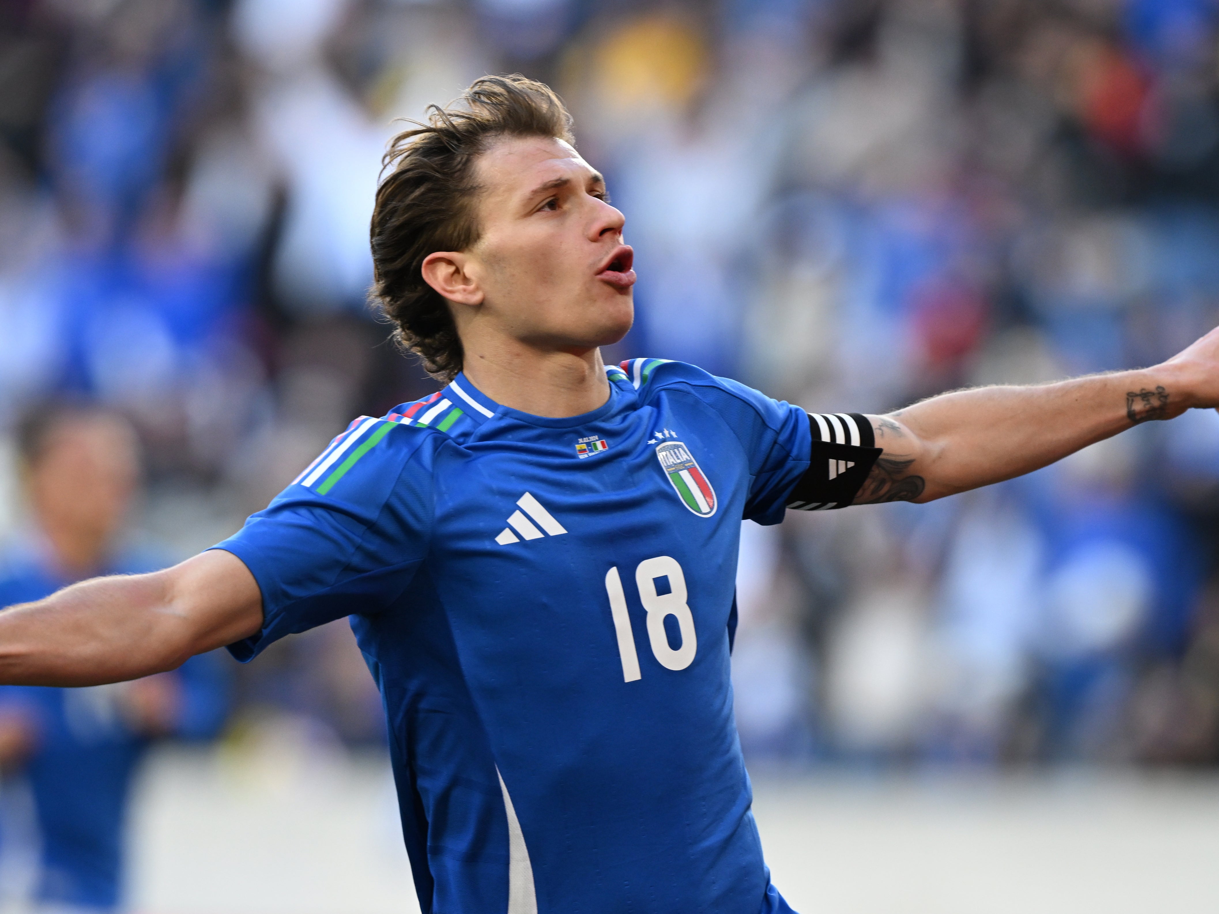 Nicolo Barella of Italy celebrates after scoring against Ecuador