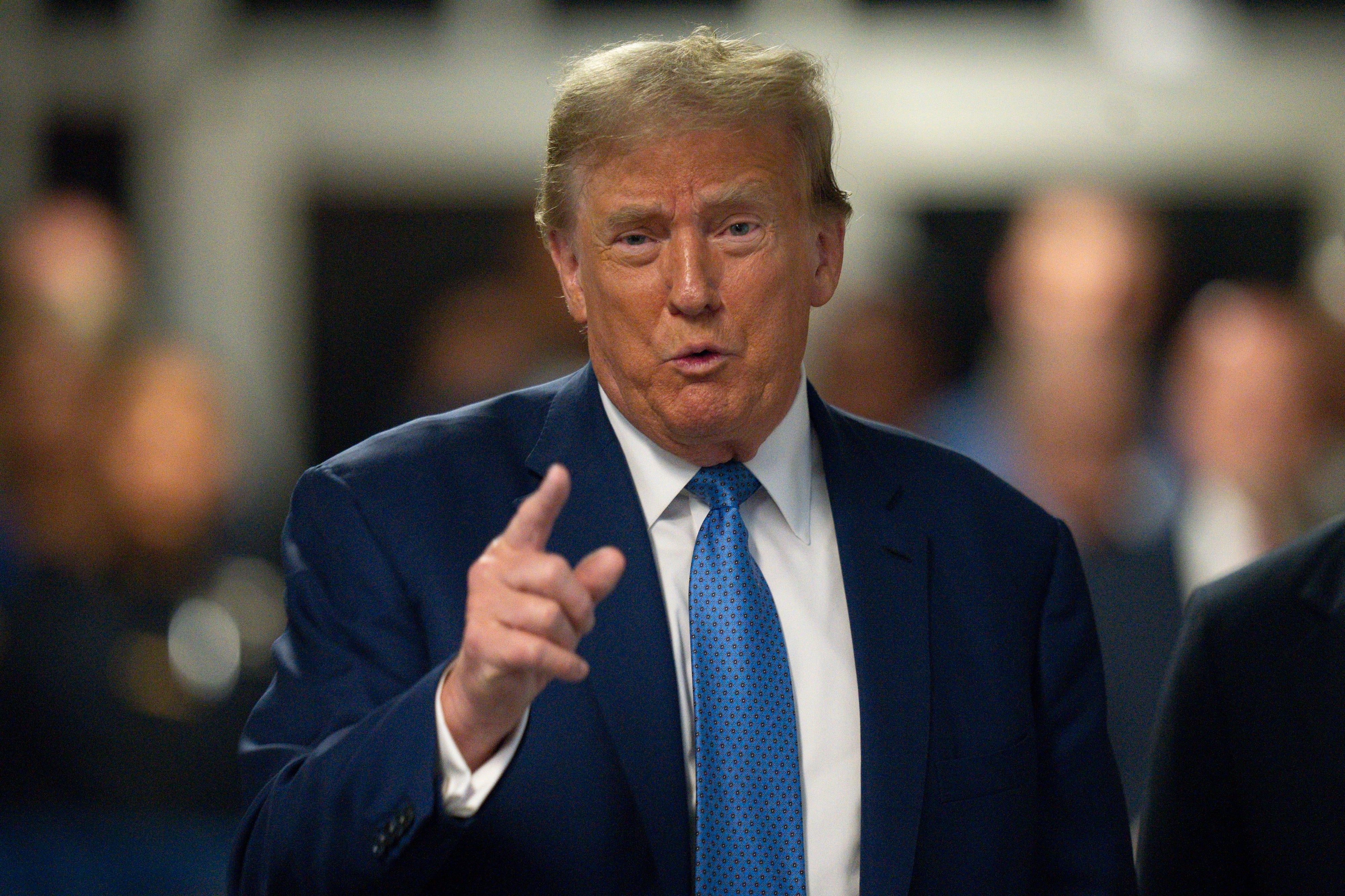 Donald Trump speaks to reporters at Manhattan criminal court in New York on Monday 20 May