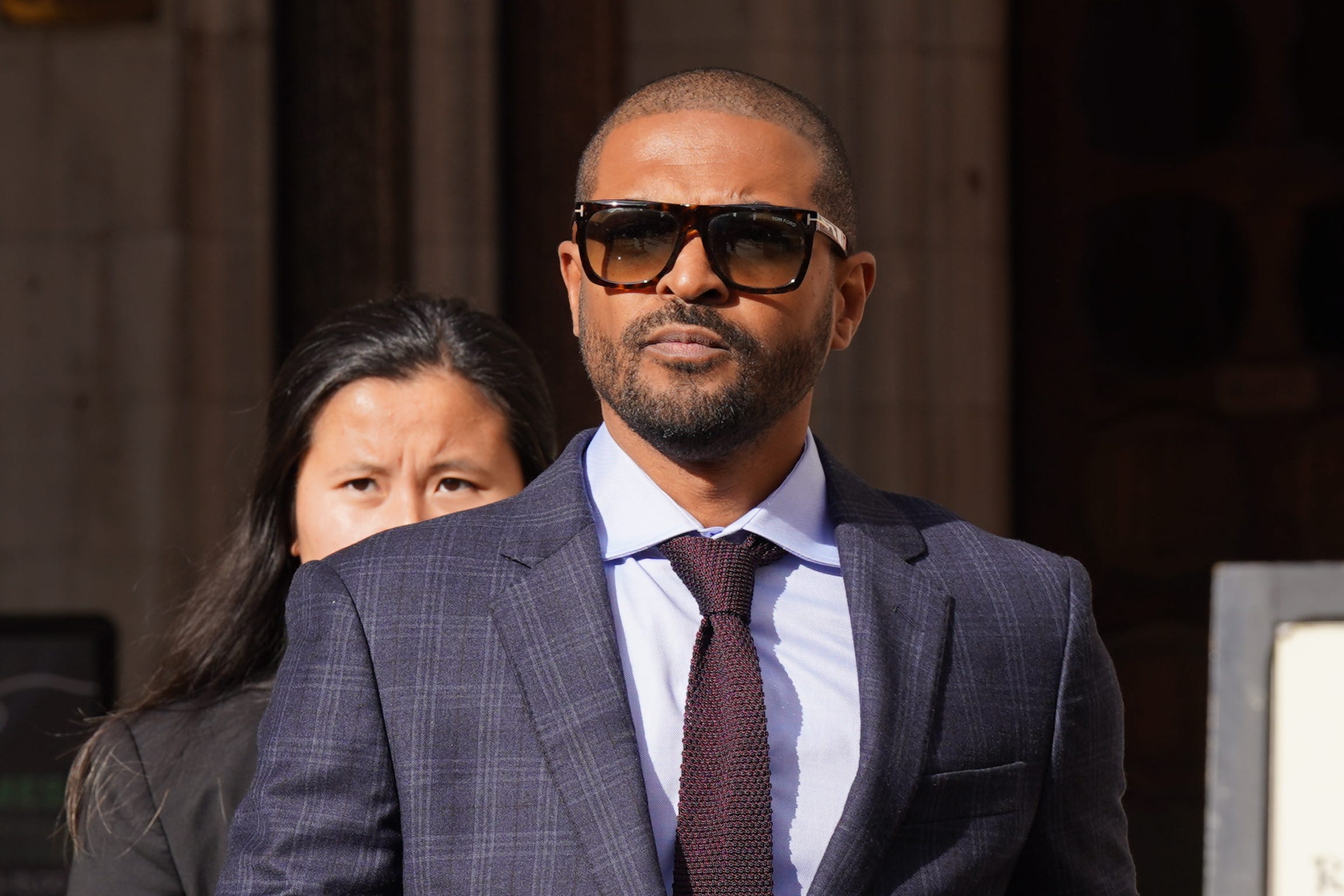 Noel Clarke leaves the Royal Courts of Justice after a previous hearing in his libel claim (Lucy North/PA)