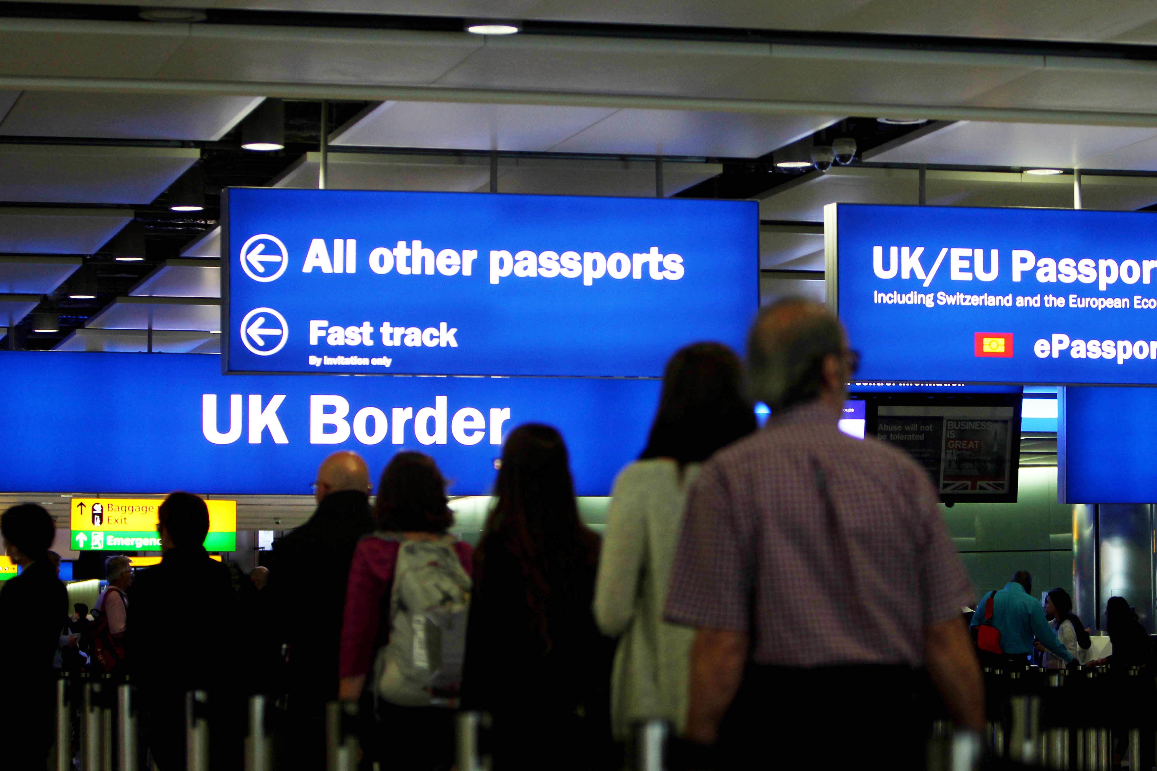 The total number of visas issued to people coming to the UK has fallen slightly (Steve Parsons/PA)