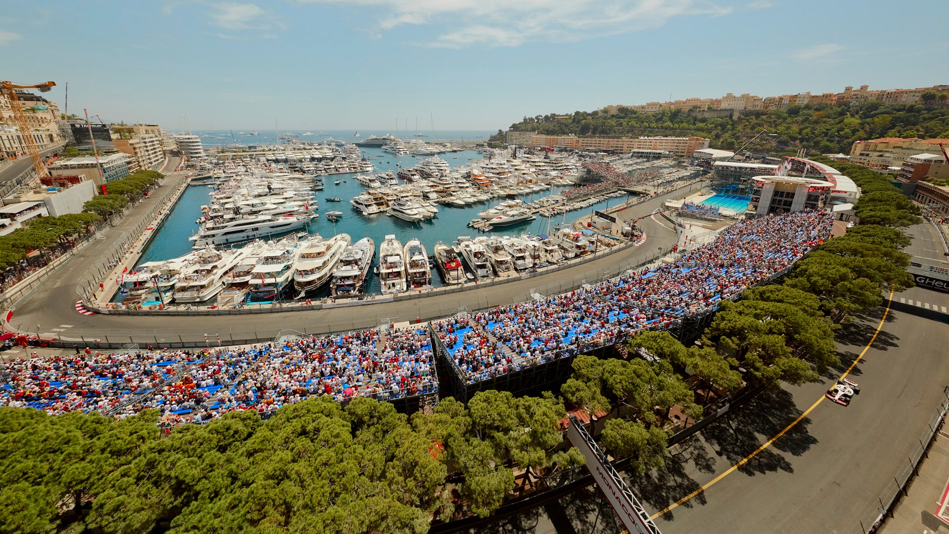 Yachts and Formula One fans are packed in, either side of the track for the Monaco Grand Prix