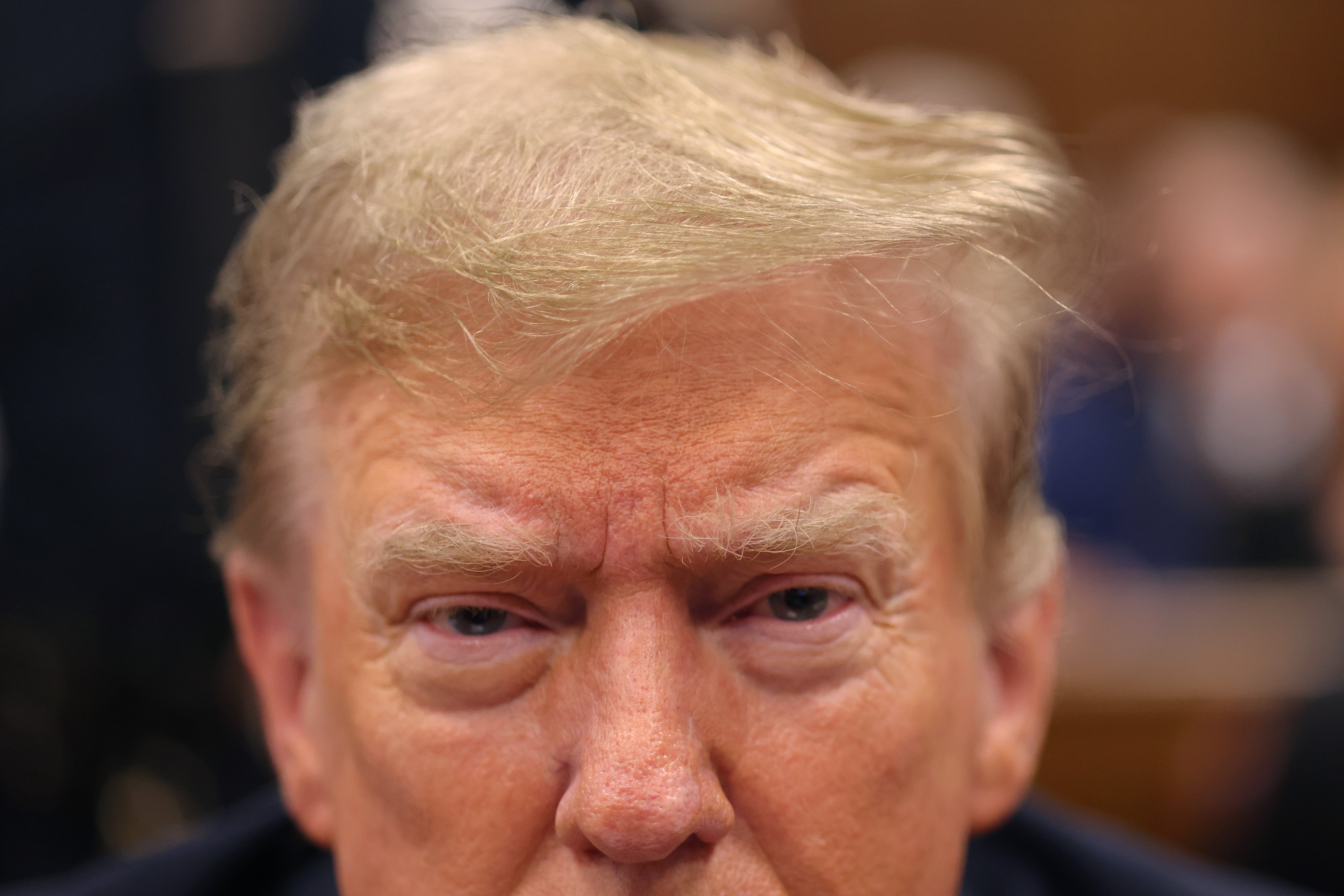 Donald Trump sits at the defense table in a criminal courtroom in Manhattan on May 21.