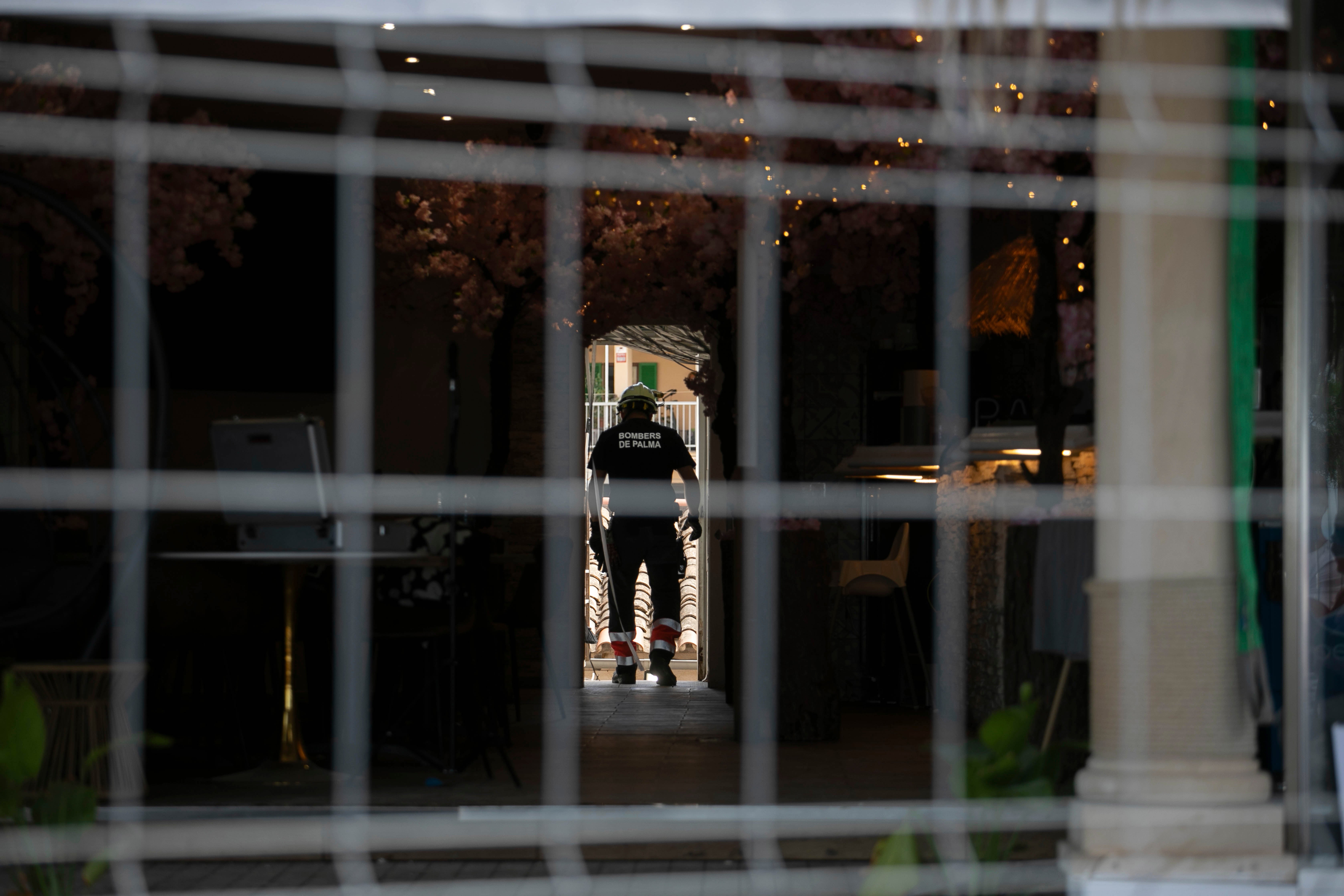 A firefighter at the scene of the collapse of the building housing the Medusa Beach Club