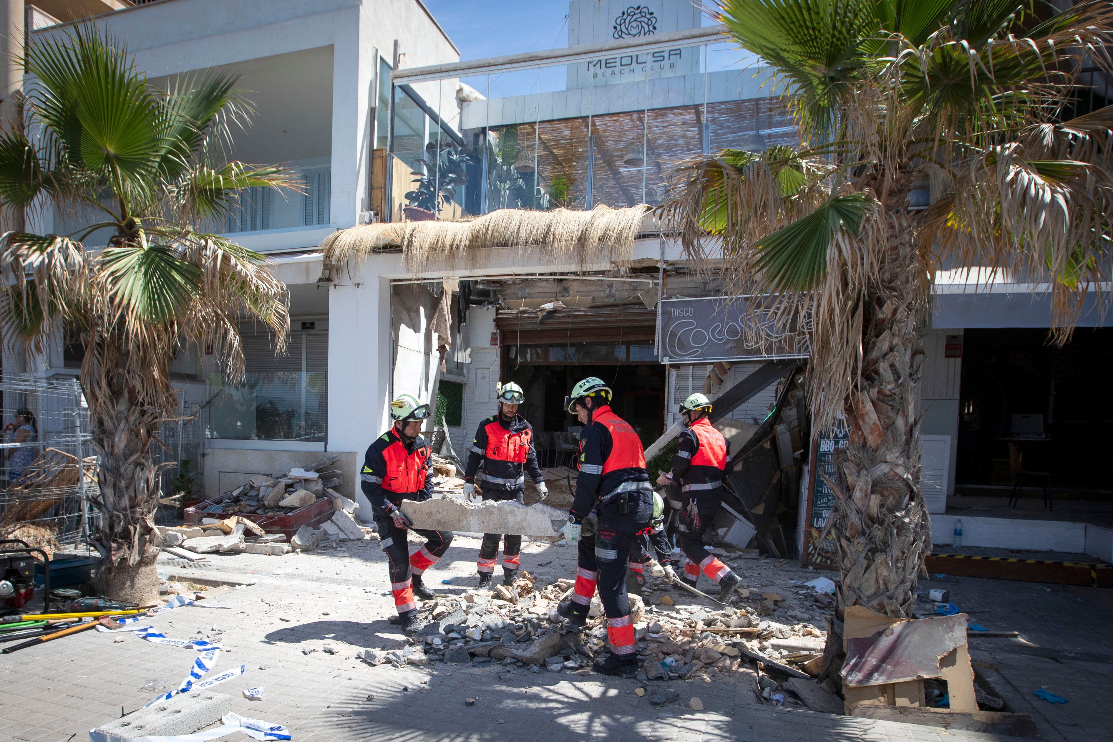 Firefighters work one day after the two-storey restaurant collapsed