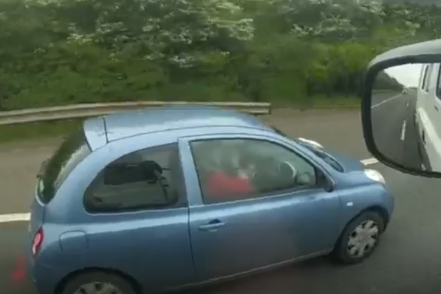 A woman filmed applying make up while driving (National Highways/PA)