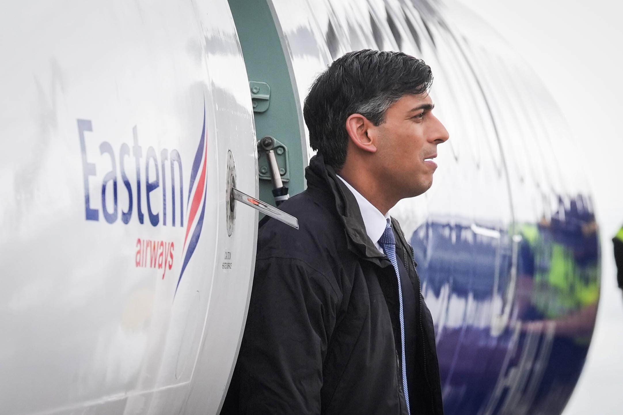 Prime Minister Rishi Sunak arrives at Birmingham airport