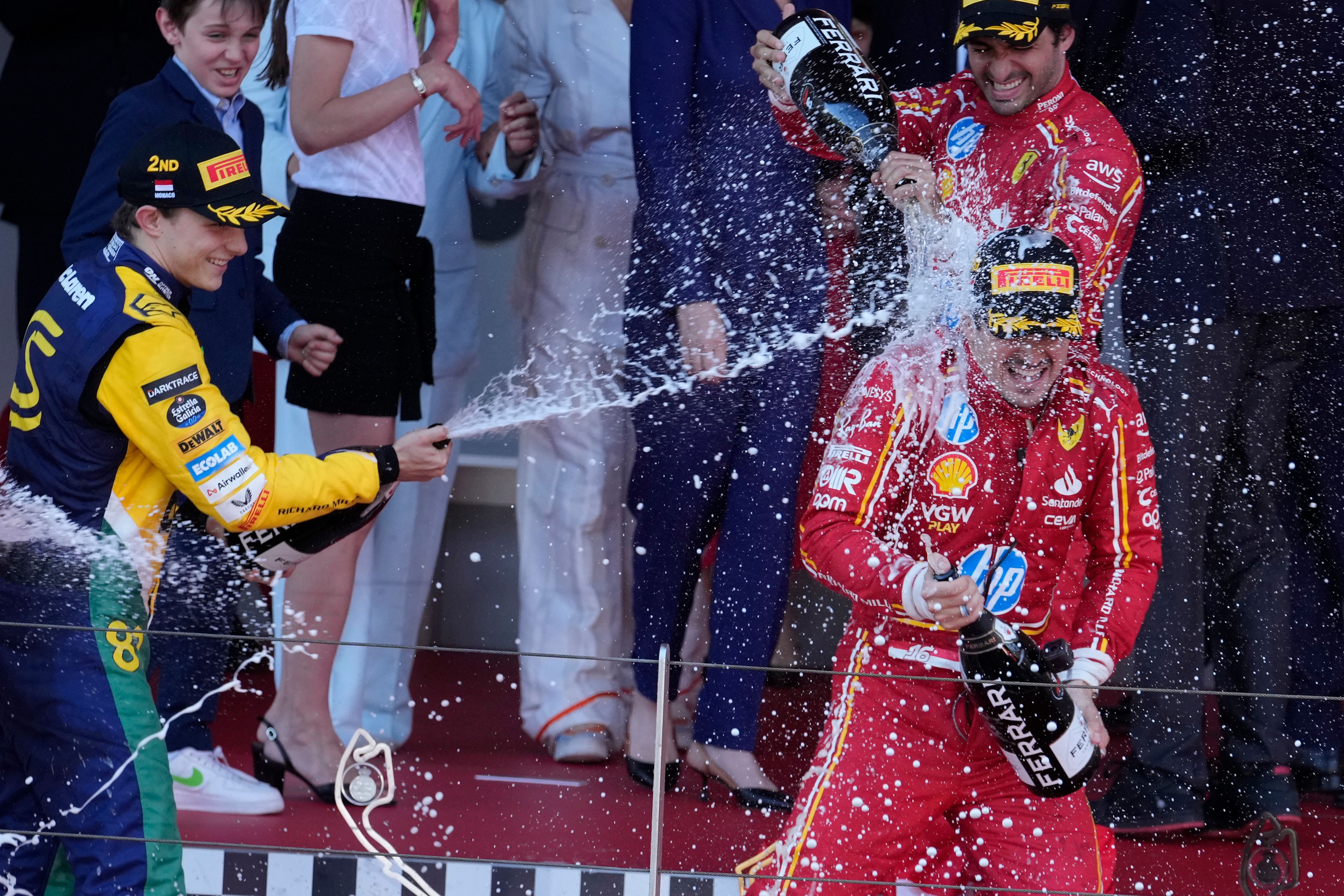 Charles Leclerc held off Oscar Piastri (left) to win his home race in Monaco (AP Photo/Luca Bruno)