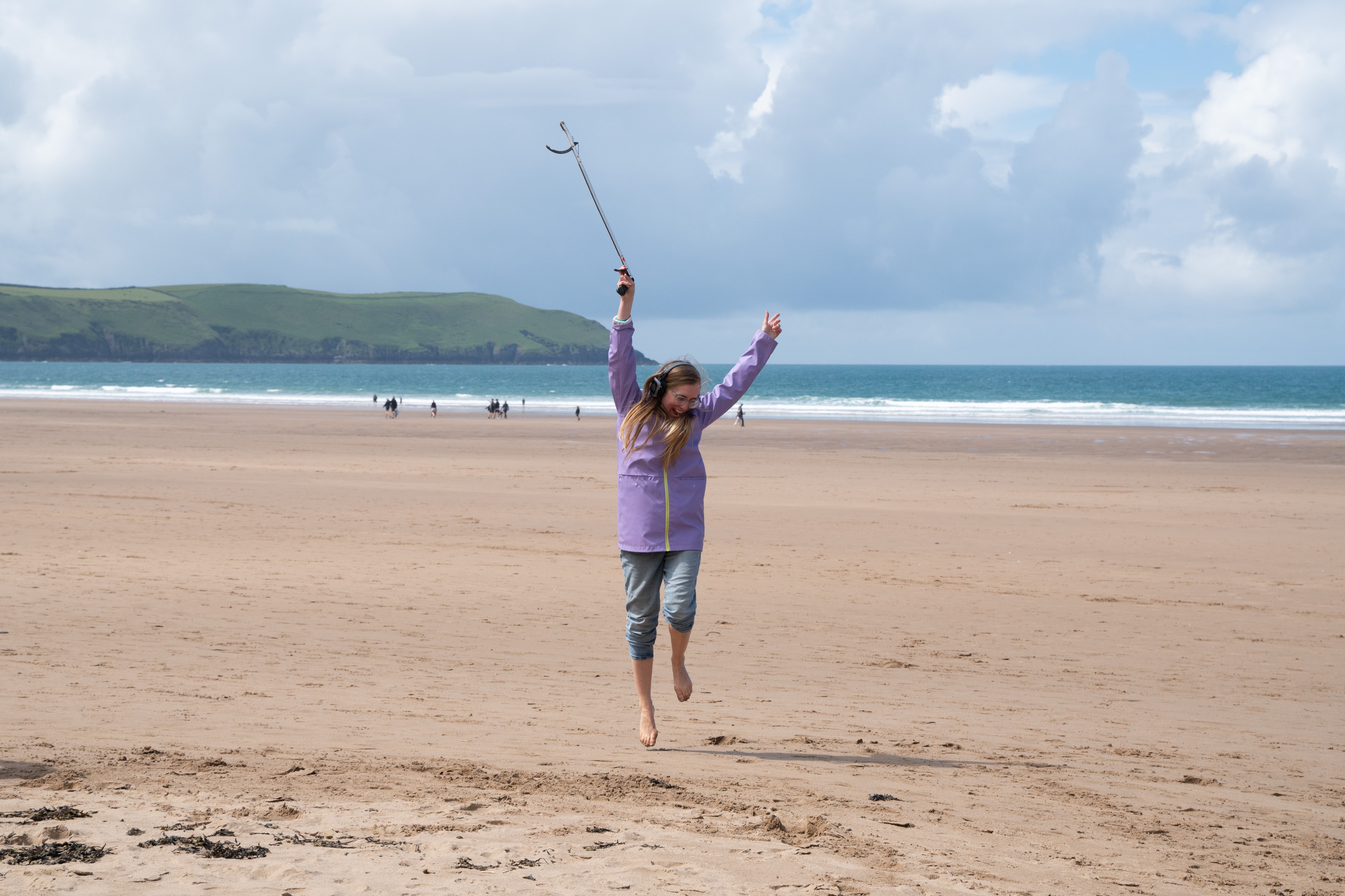 A silent disco beach clean at Woolacombe beach in Devon (Sophie Bolesworth/National Trust/PA)