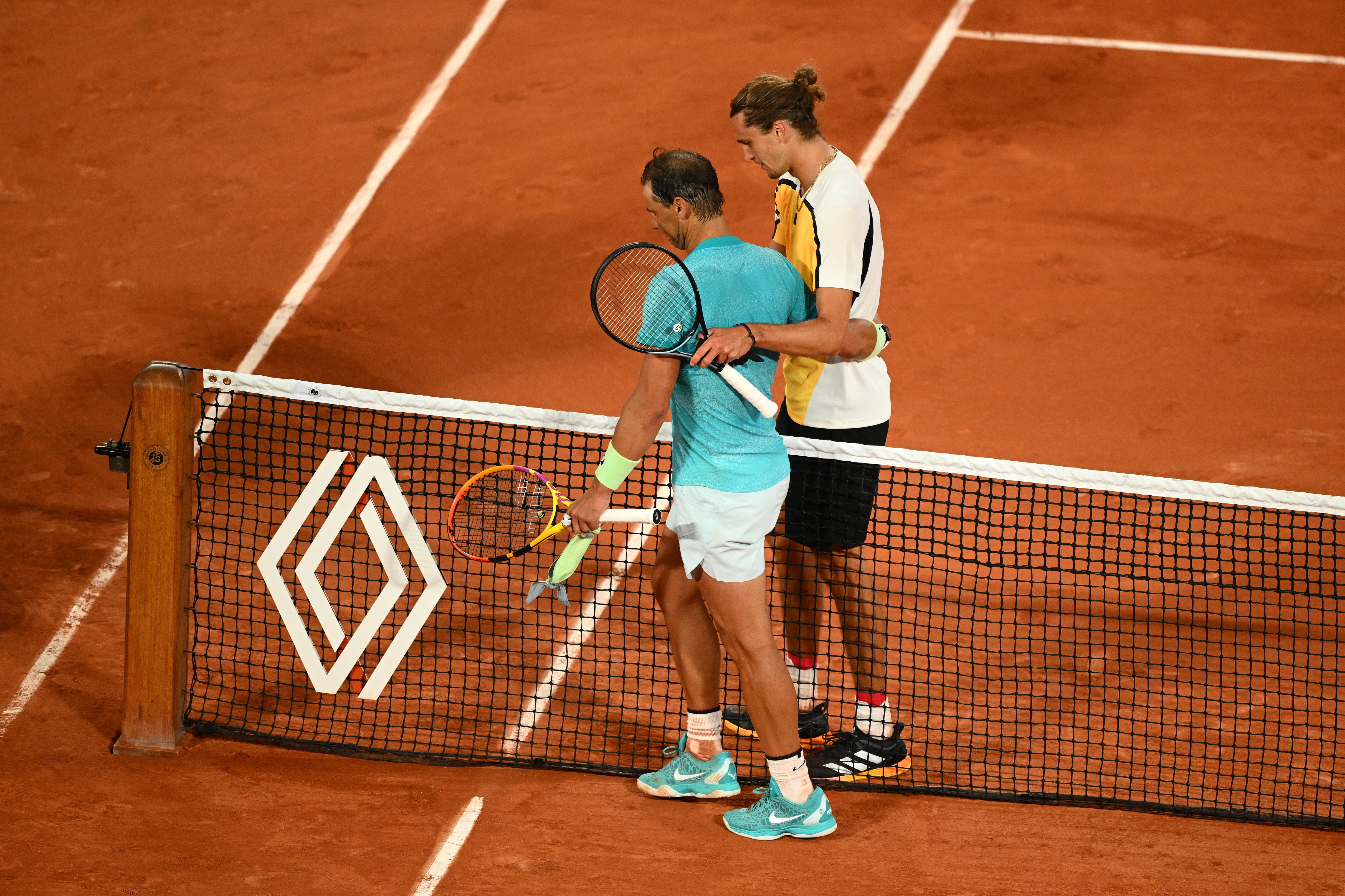 Nadal embraces Alexander Zverev at the net