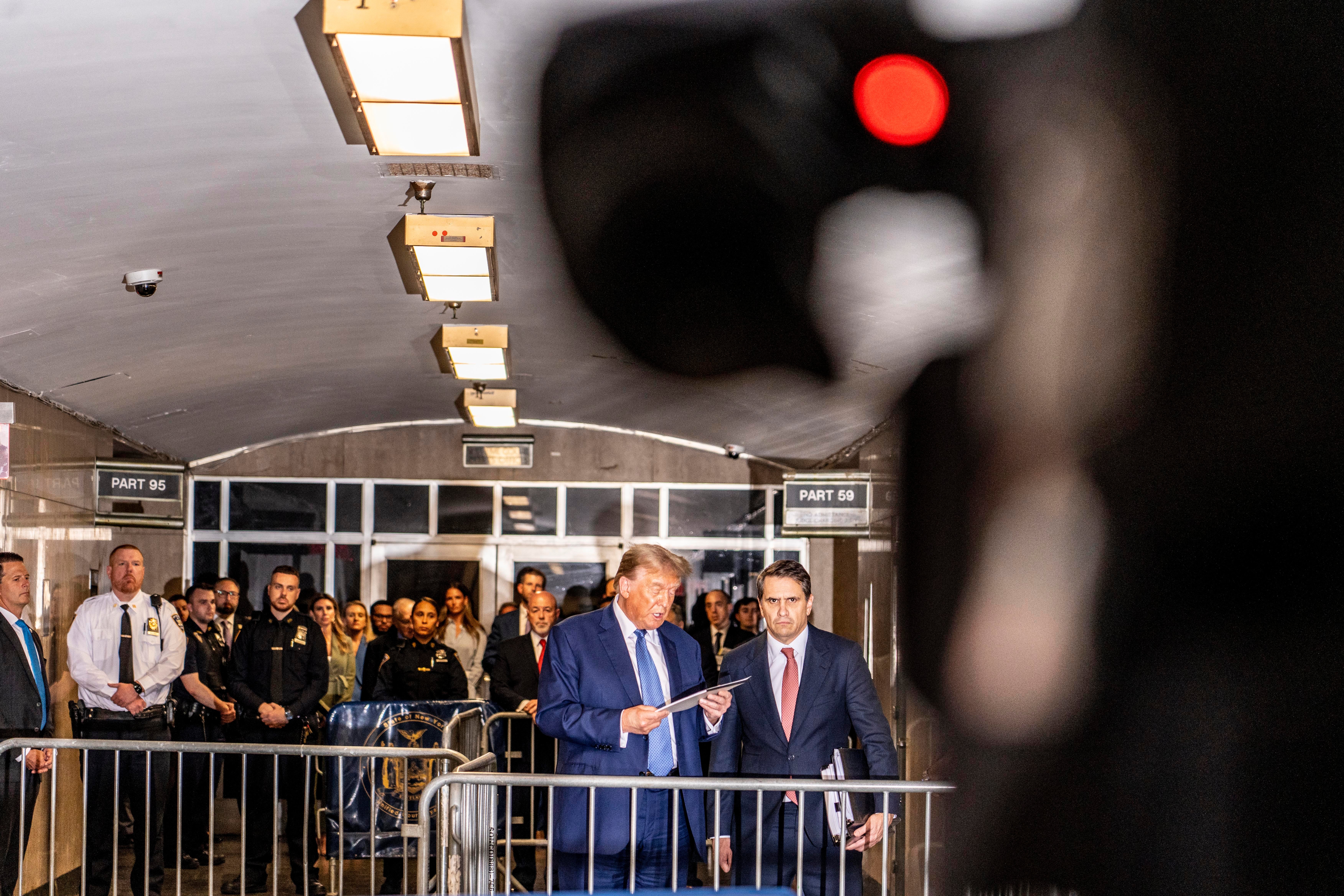 Donald Trump speaks to cameras outside his criminal trial in Manhattan on May 20