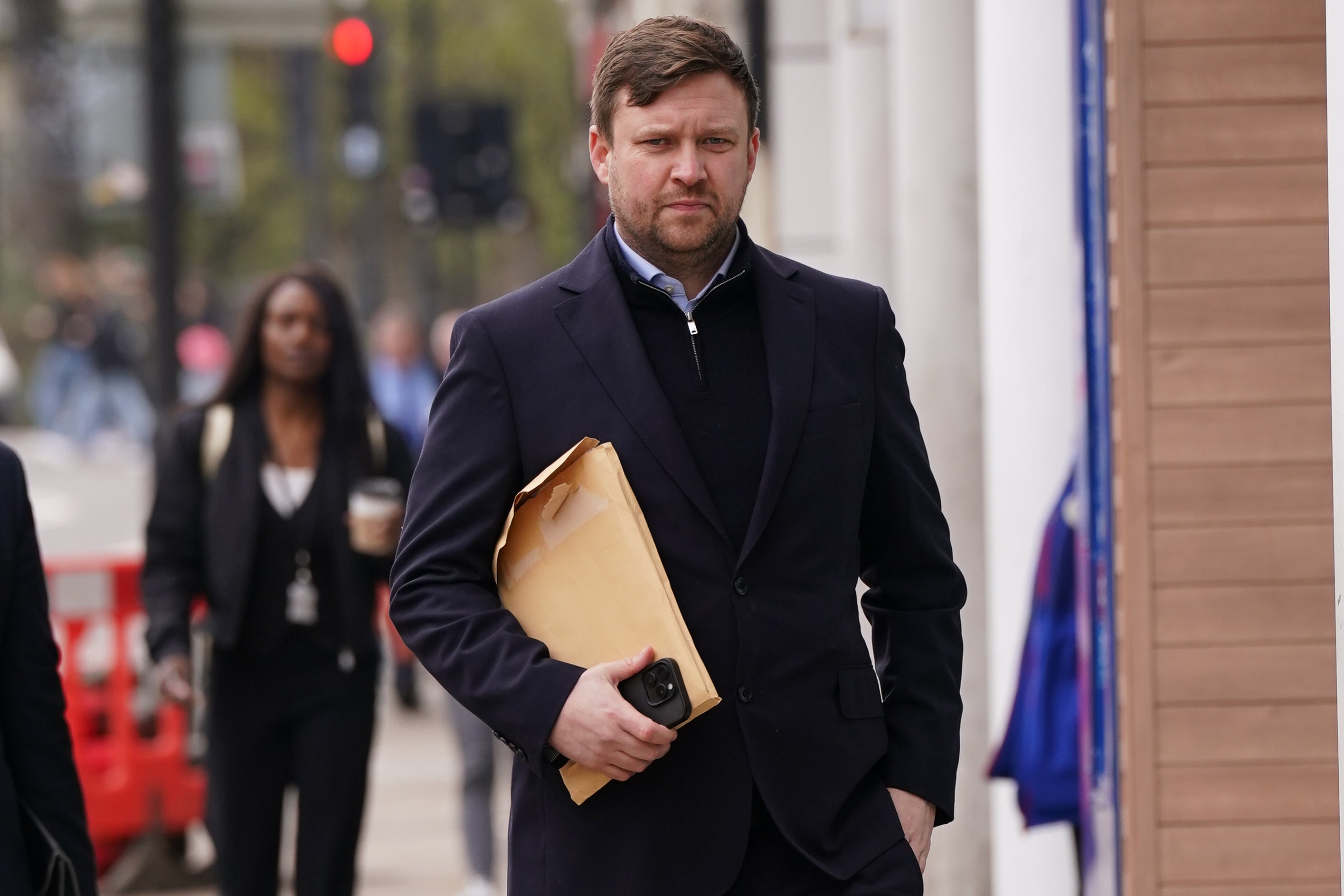 Scott Law, 43, arrives at Highbury Corner Magistrates' Court