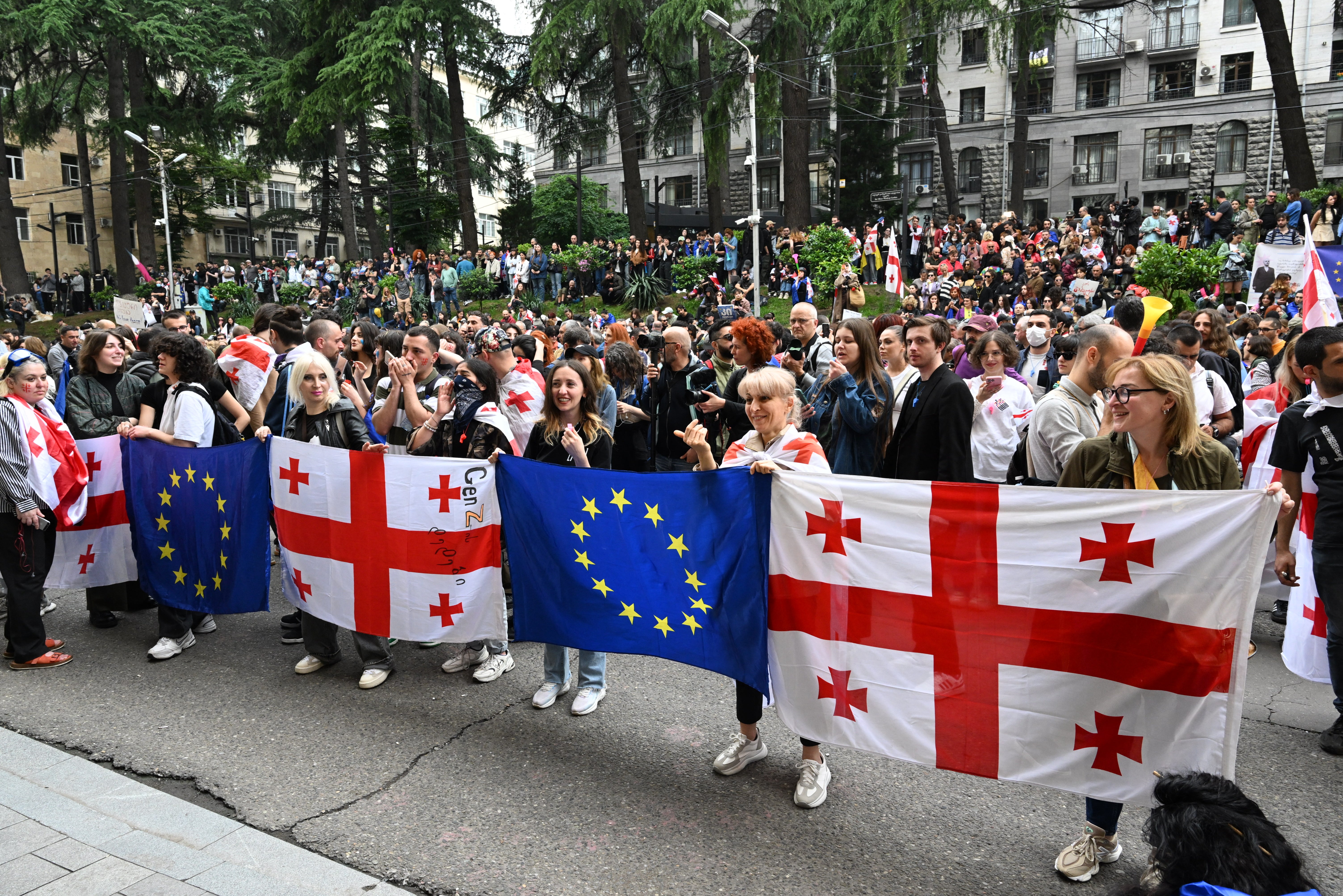 Protesters outside parliament before the vote