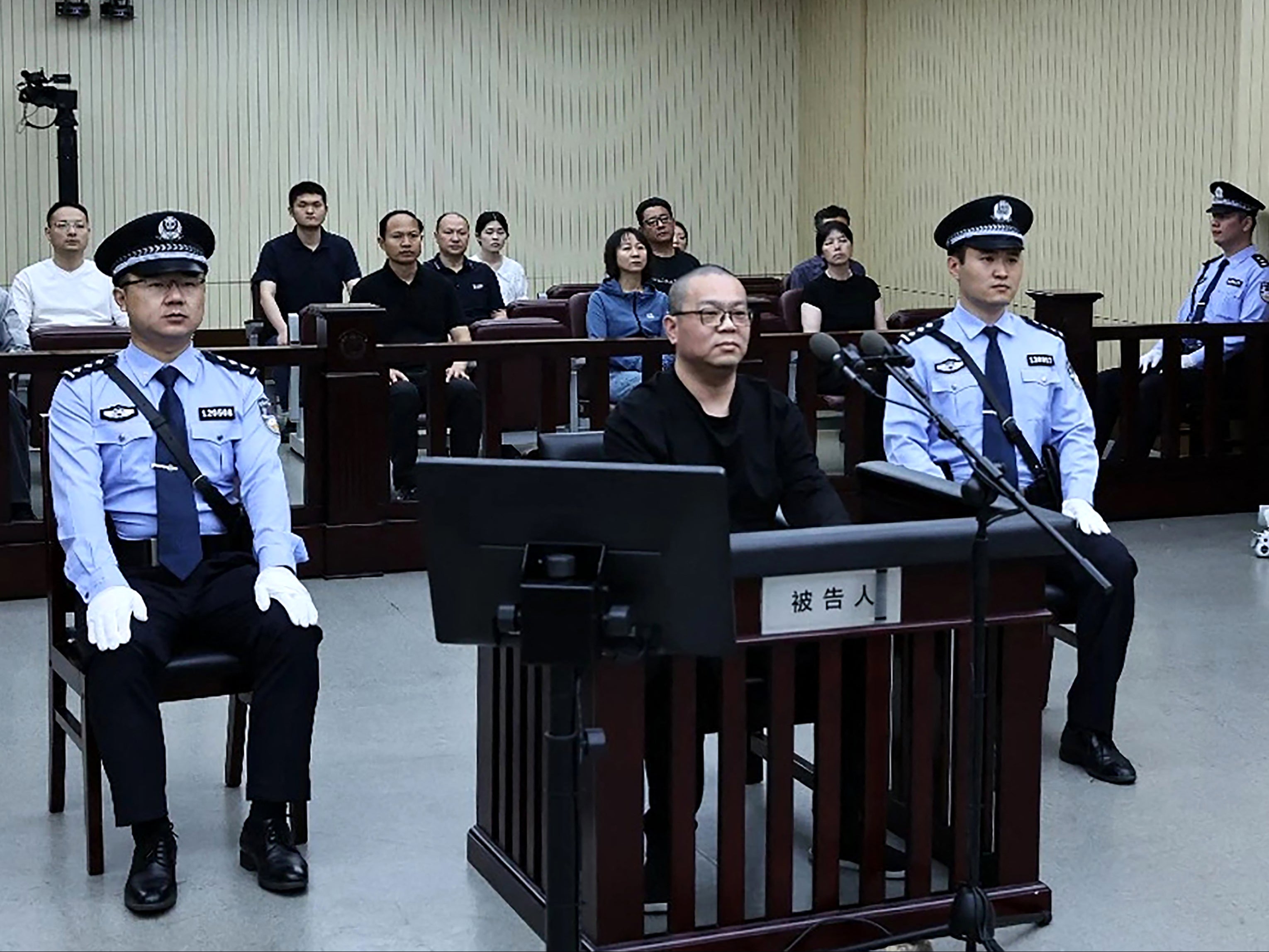 Bai Tianhui during his sentencing at a court in Tianjin on 28 May