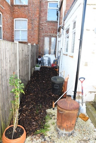 Haunting photos were shown to the court of the garden side return where primary school teacher Fiona Beal buried her partner