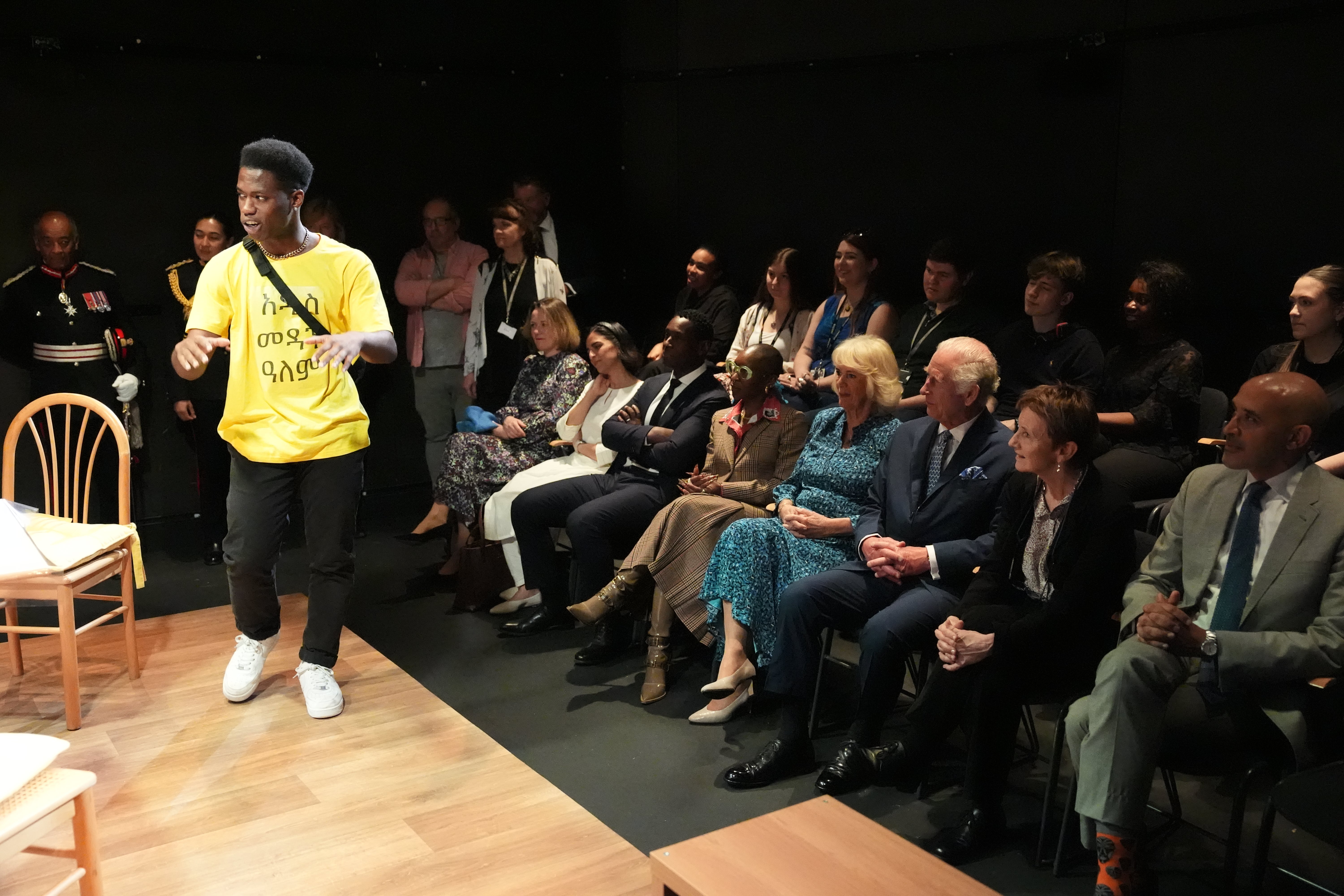 King Charles III, Patron of the Royal Academy of Dramatic Art (RADA), and Queen Camilla, watching an extract of a play performed by third year acting students