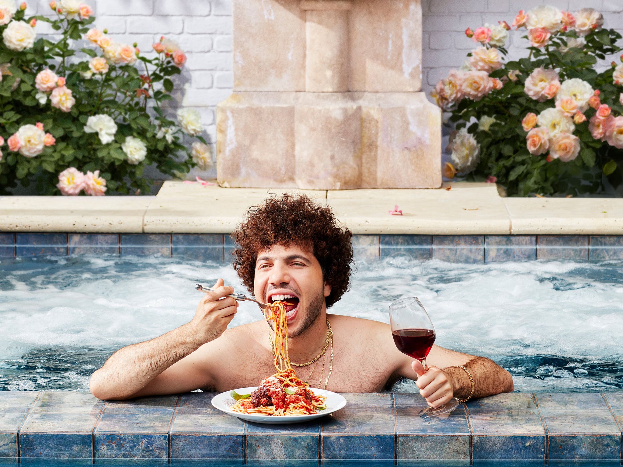 Songwriter Benny Blanco has released his first cookbook in which he eats spaghetti and drinks wine