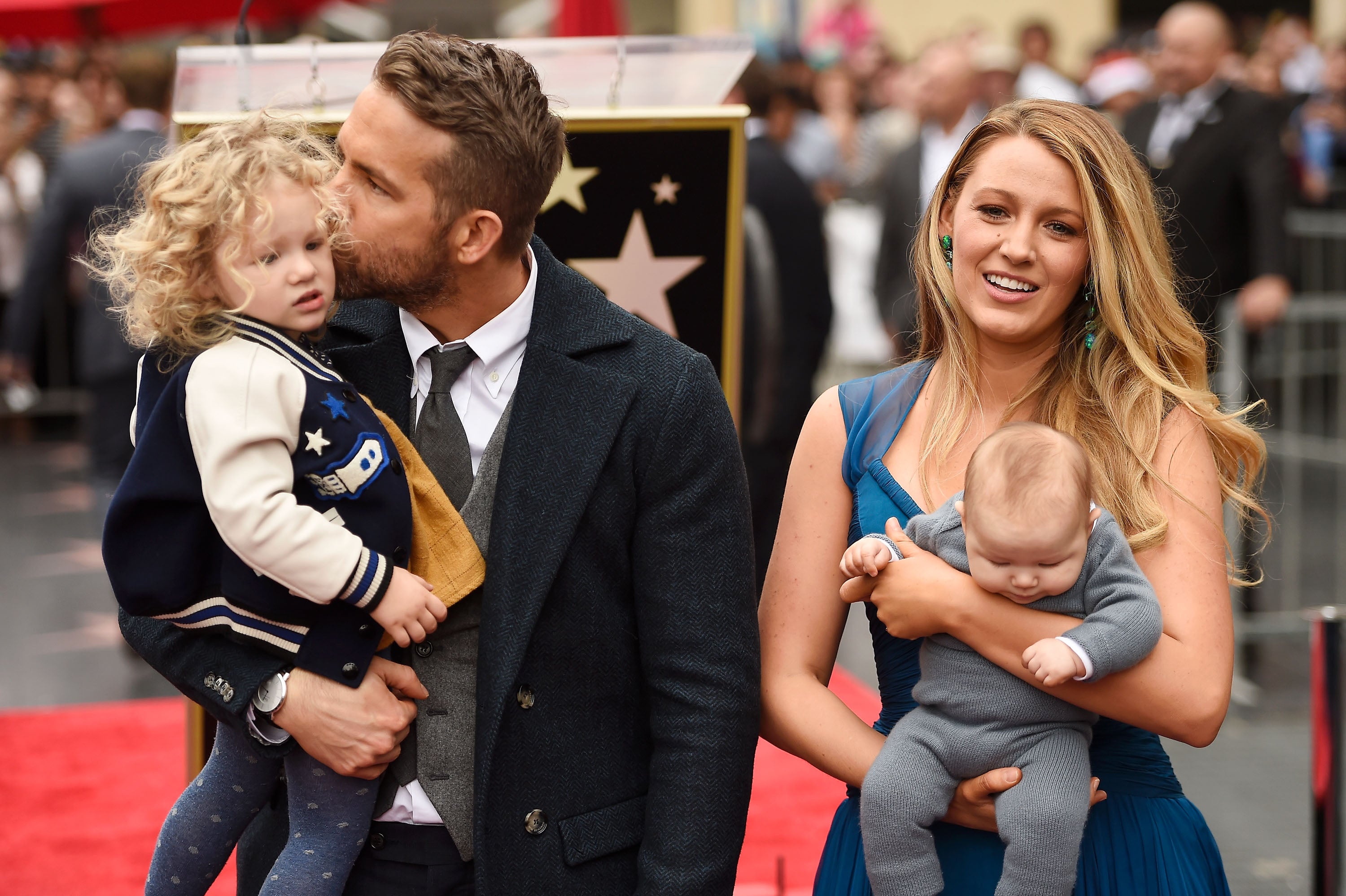 Ryan Reynolds and Blake Lively pose with their daughters during Hollywood Walk of Fame ceremony in December 2016