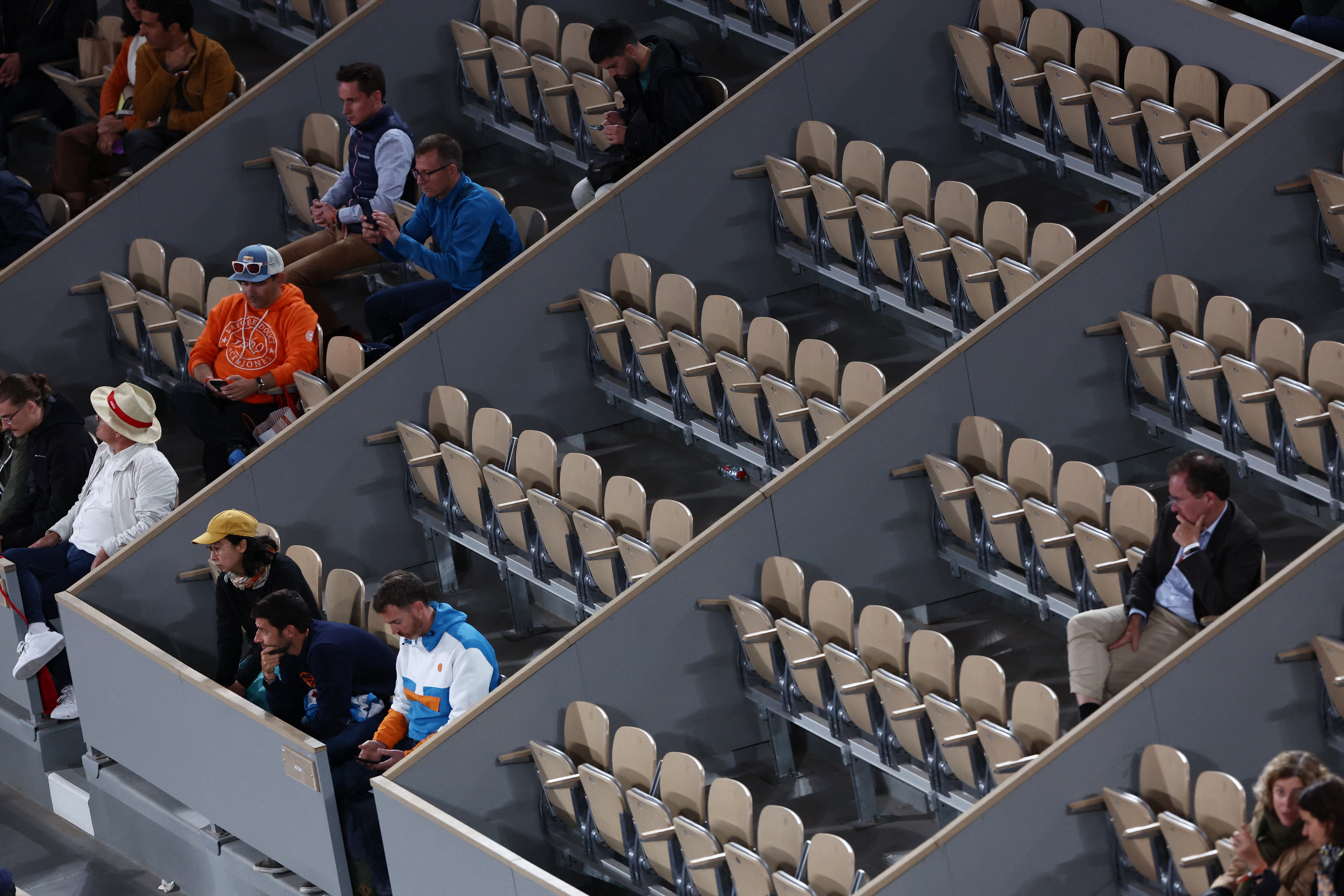 Empty seats can be seen during the second round match between Iga Swiatek and Naomi Osaka