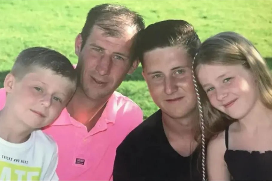 Scott Hendy surrounded by his children Harvey, Lewis and Holly