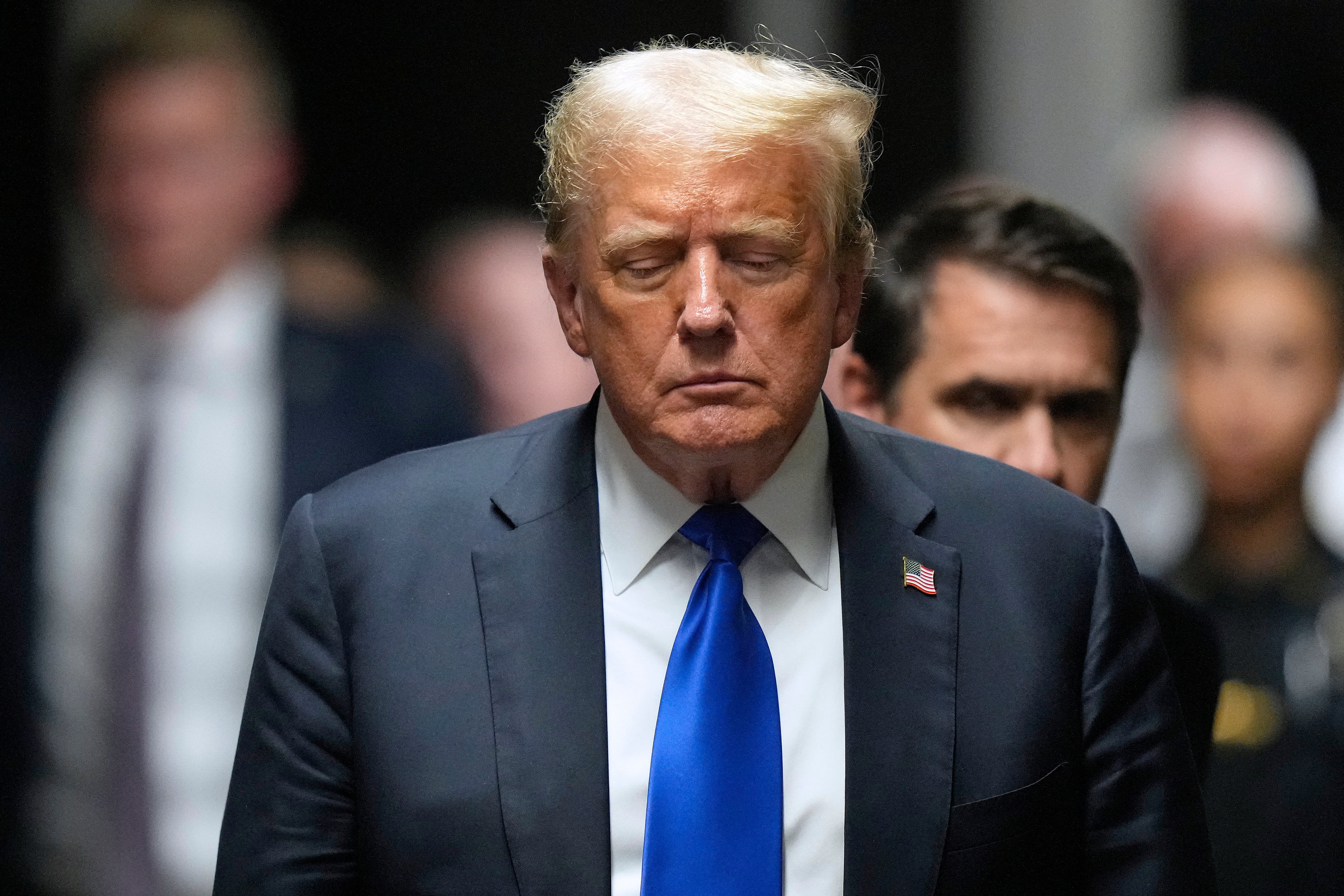 Former US President and Republican presidential candidate Donald Trump exits the courtroom after he was convicted in his criminal trial at Manhattan Criminal Court