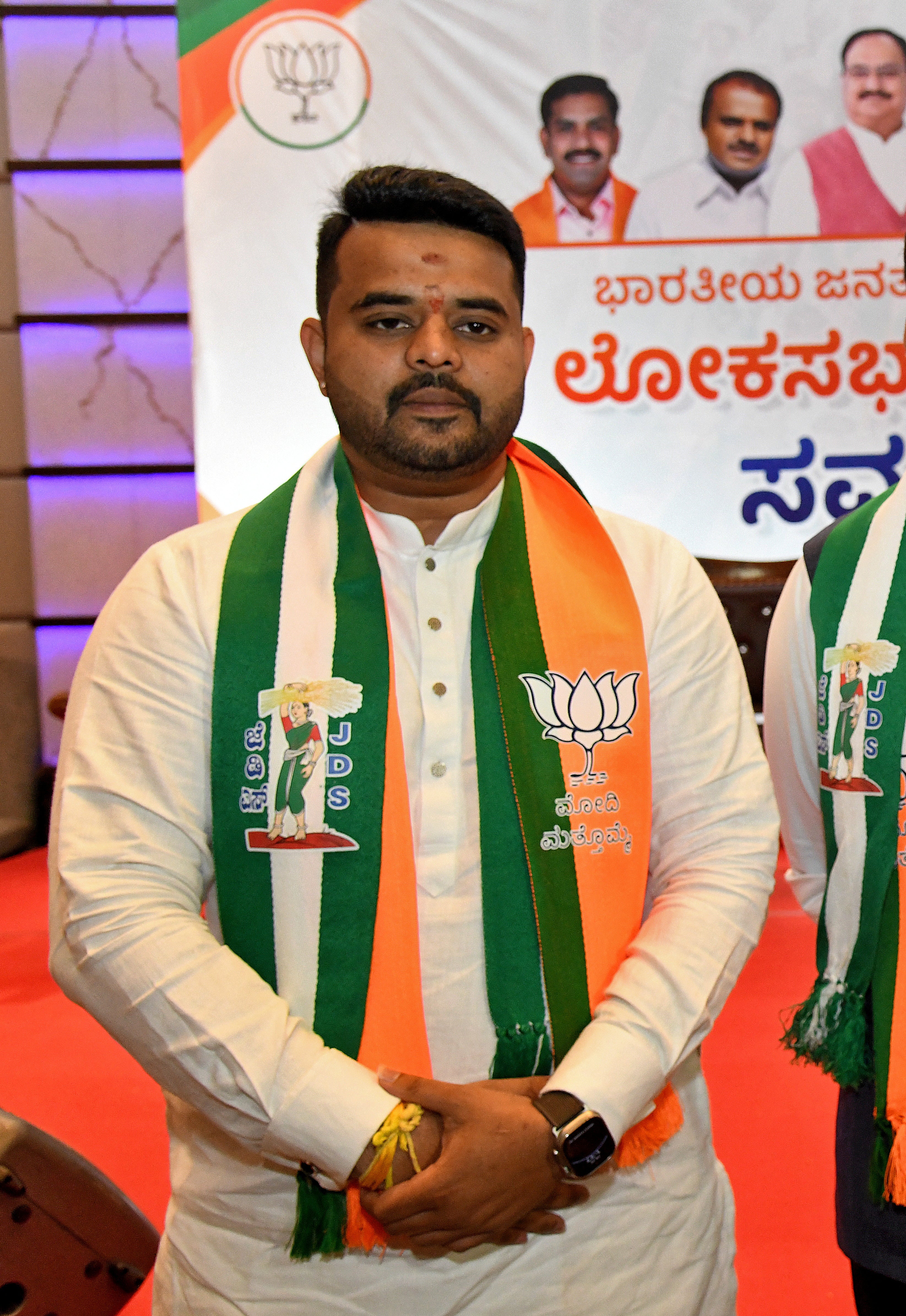 Prajwal Revanna attends a meeting to form an alliance with the Bharatiya Janata Party on 29 March 2024