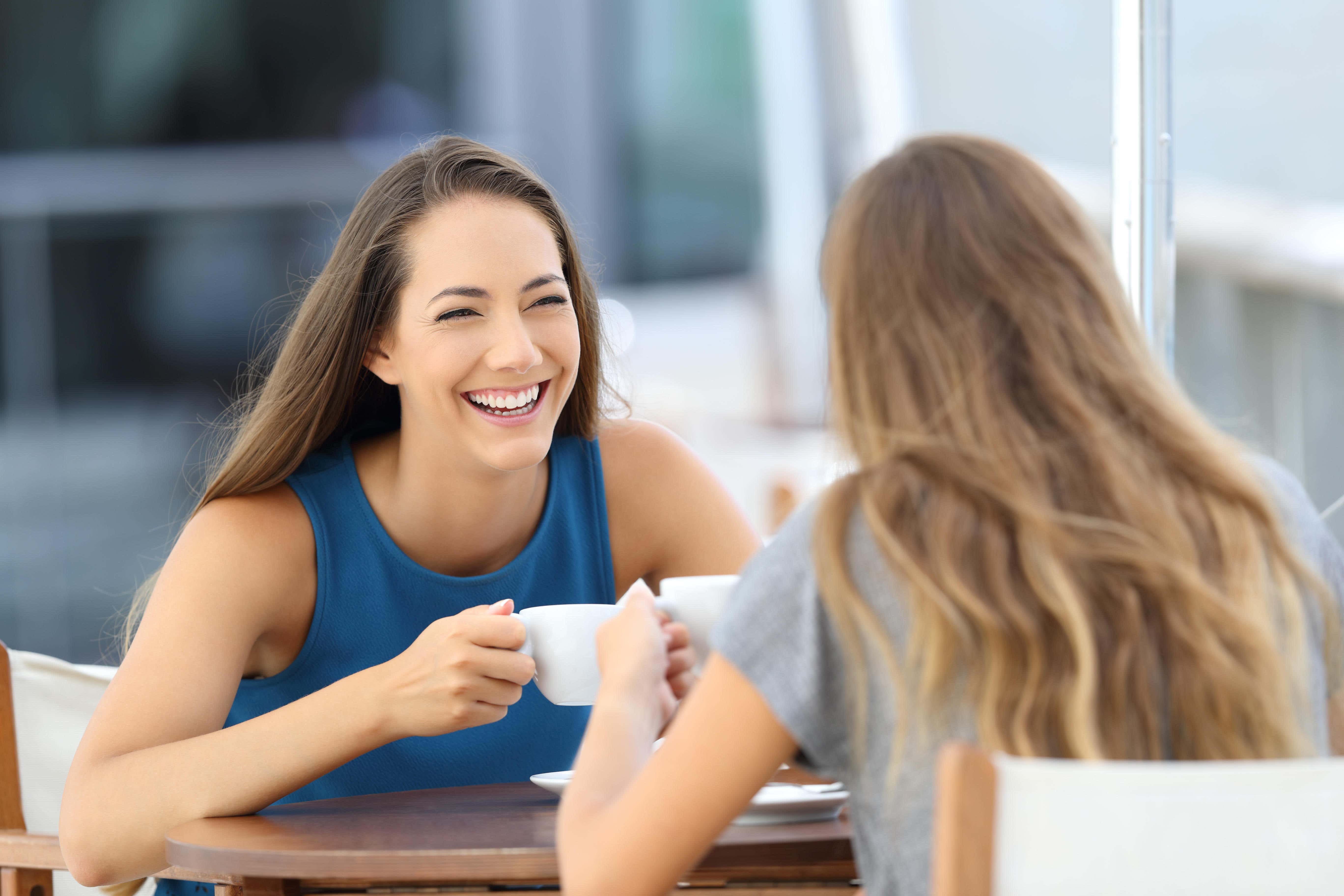 More than half of people feel comfortable discussing money with their friends, according to new research by Virgin Money (Alamy/PA)