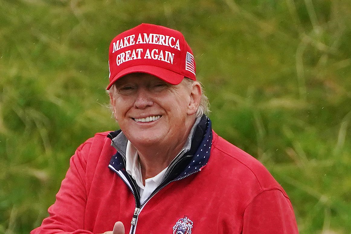 Former US president Donald Trump on the 15th hole at Trump International Golf Links & Hotel in Doonbeg, Co. Clare, during his visit to Ireland (Brian Lawless/PA)