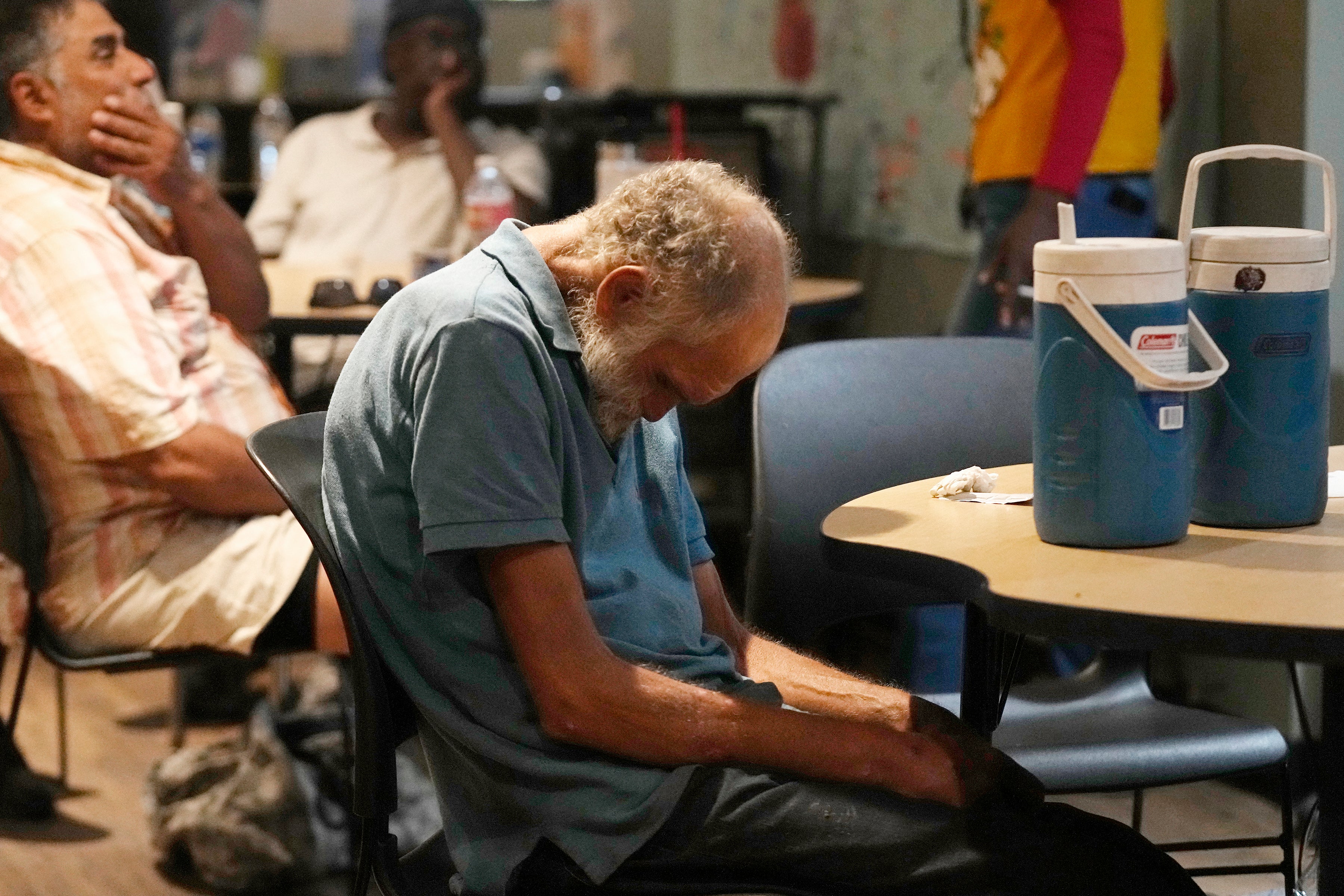 Patrons try to cool off inside at the Justa Center as temperatures soar in Pheonix