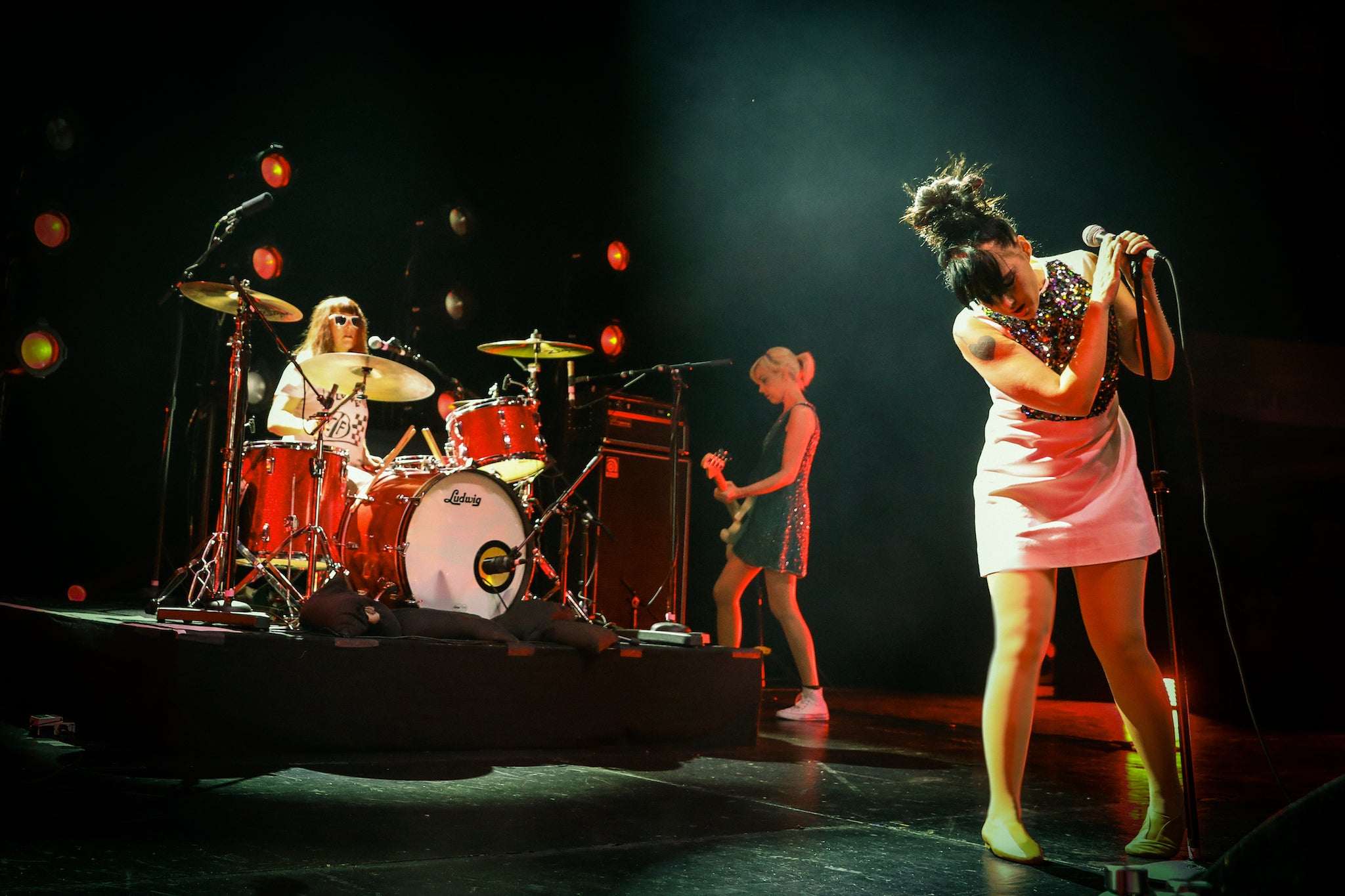 Hanna on stage with Bikini Kill at The Hollywood Palladium in 2019