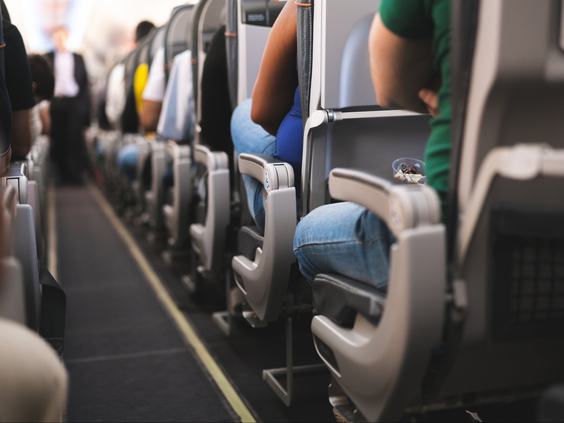 An aisle on an airplane ( Getty Images/iStockphoto )