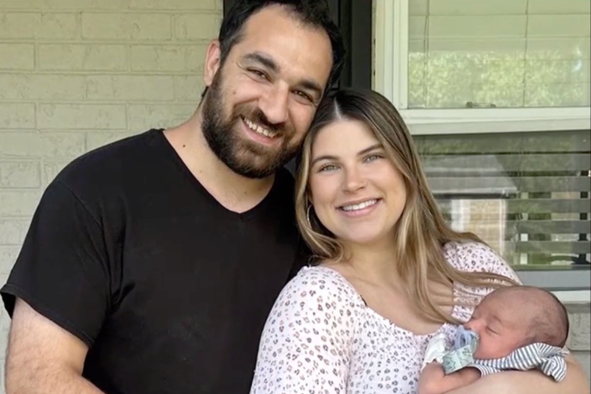 Mark and Chloe Mansoor pictured with newborn son, Ezra