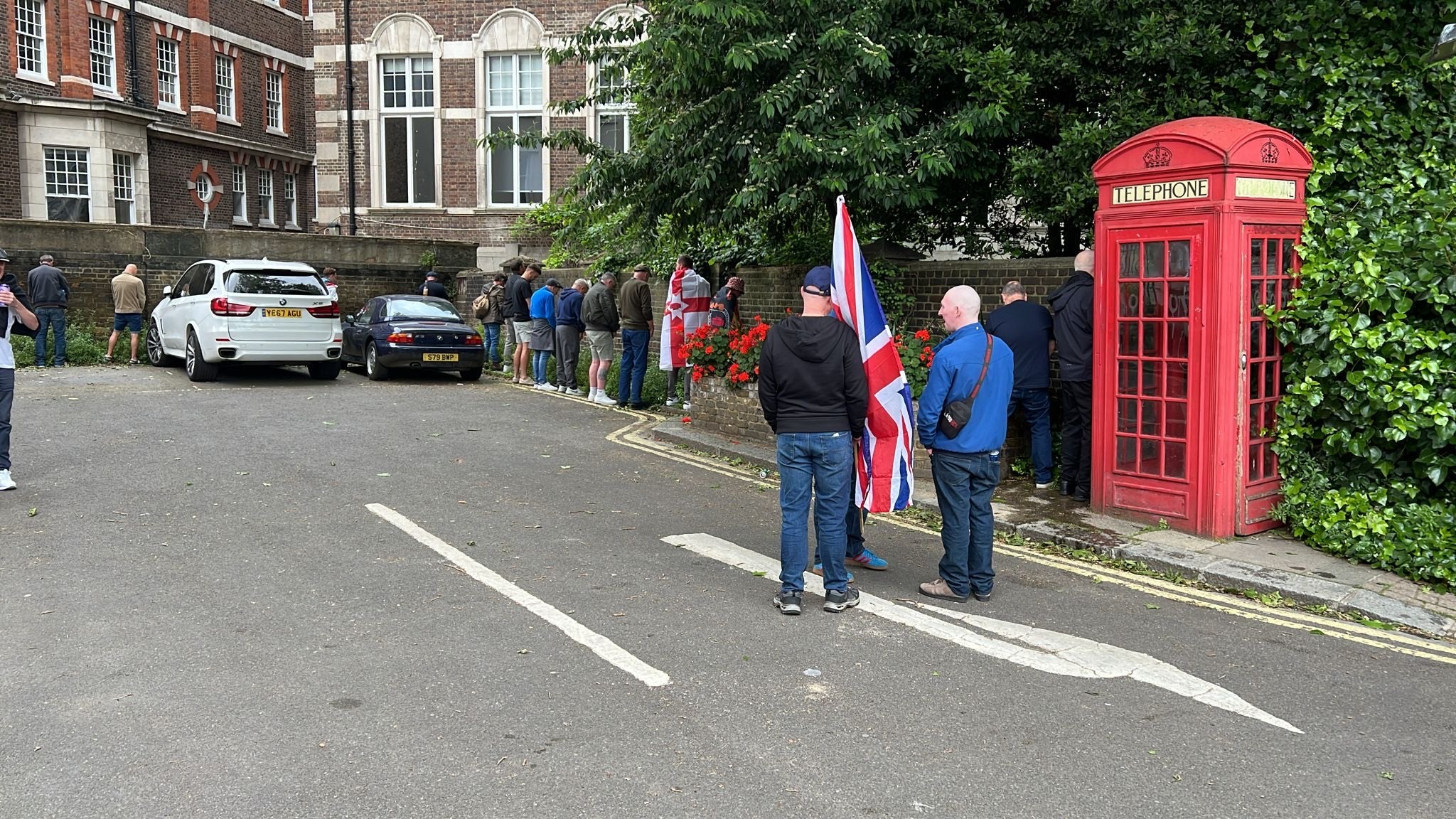 Dozens of protesters are seen urinating in public at the Tommy Robinson screening