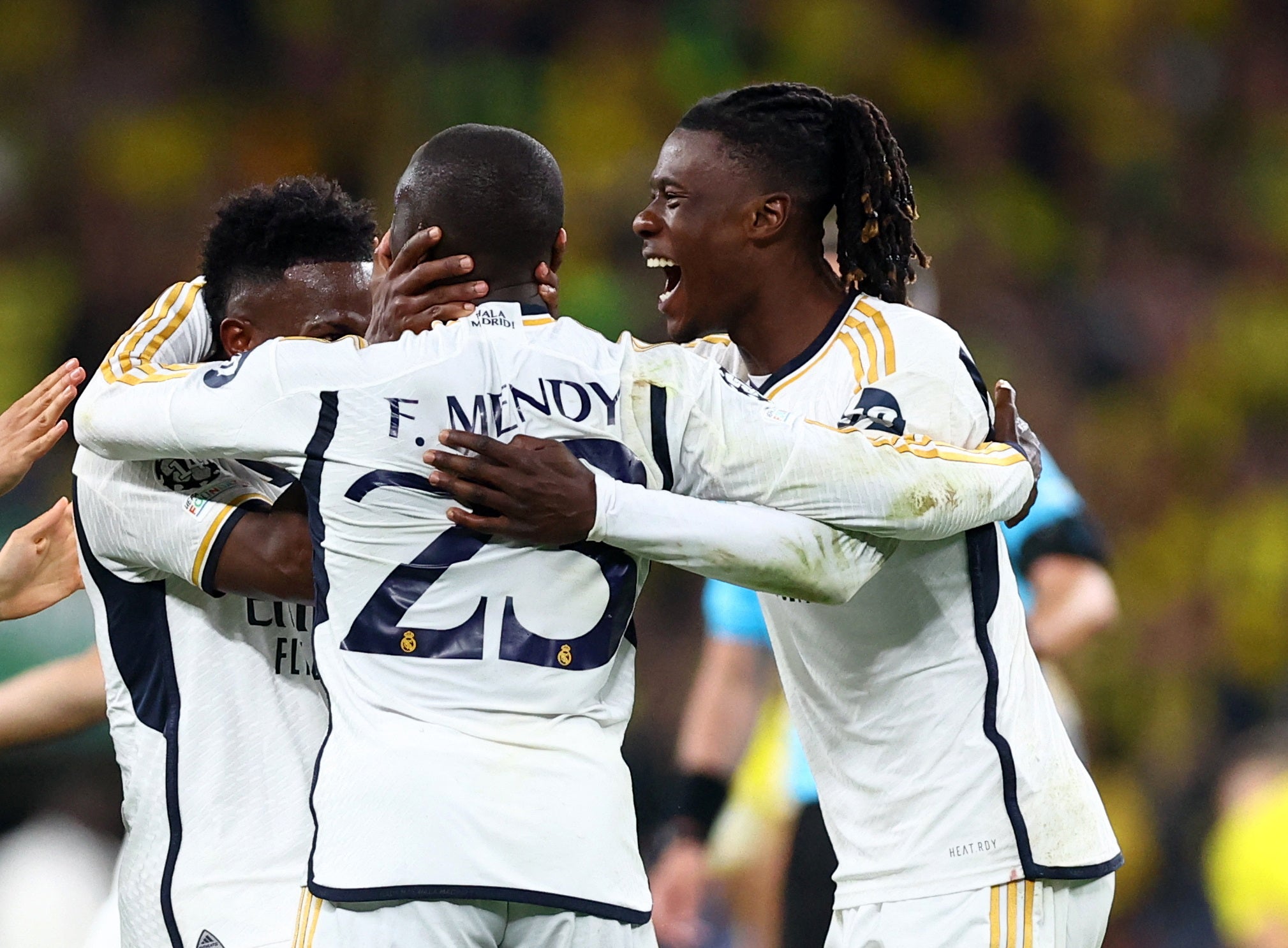 Eduardo Camavinga, right, celebrates with his teammates