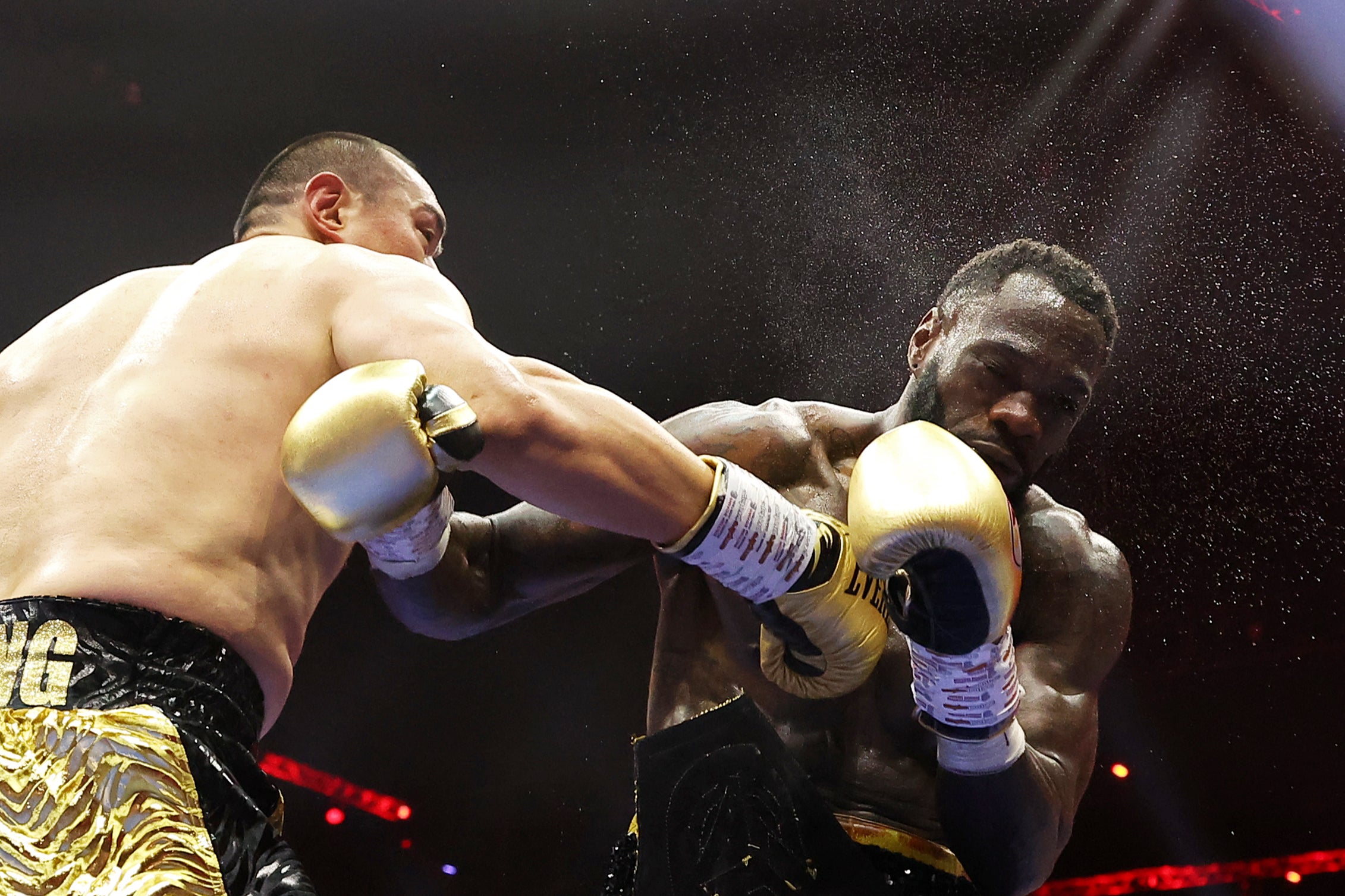 Zhilei Zhang (left) finished Deontay Wilder last time out