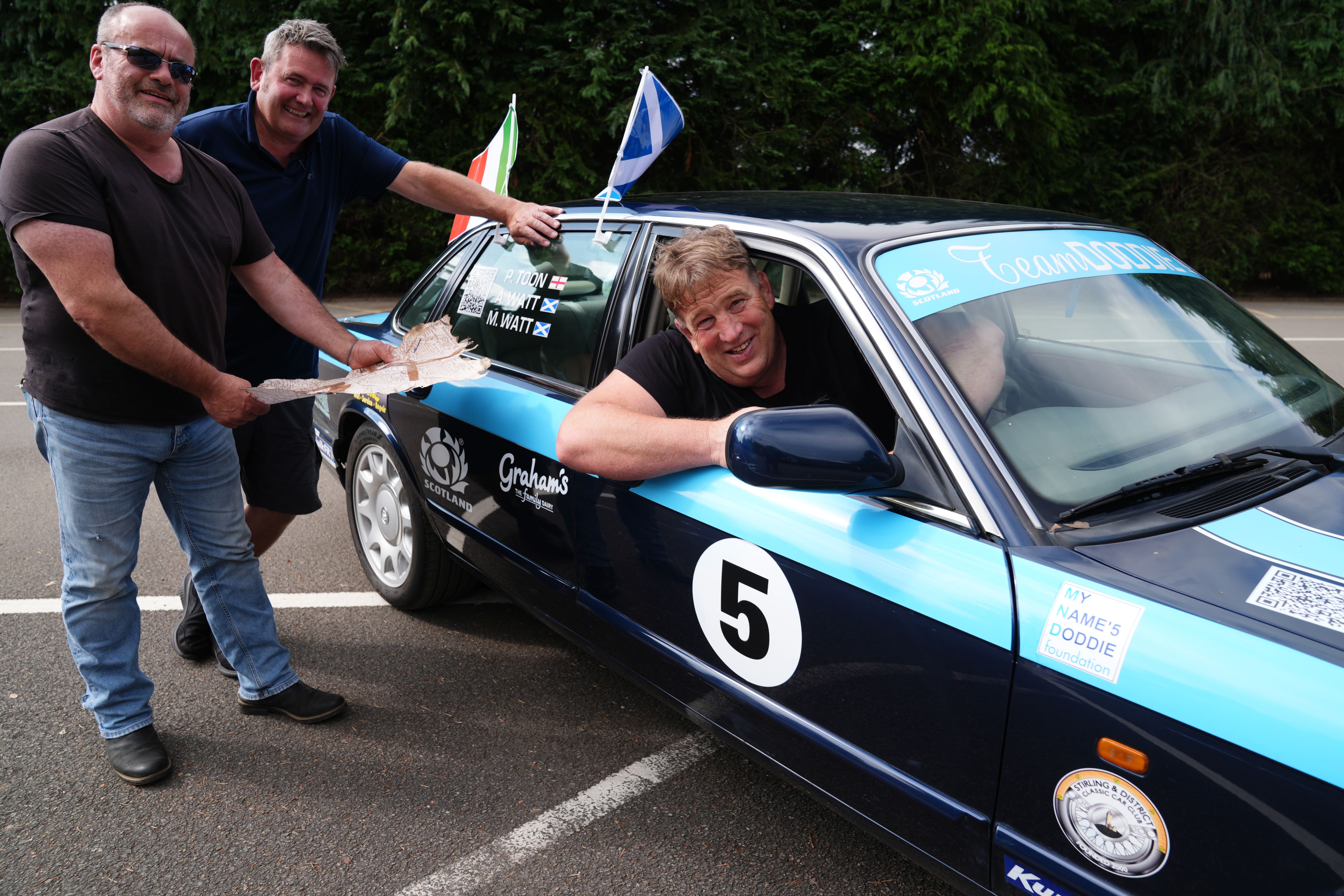 Alan Watt with friends Paul Toon (centre) and Murray Watt (left) will travel to Rome (Andrew Milligan/PA)