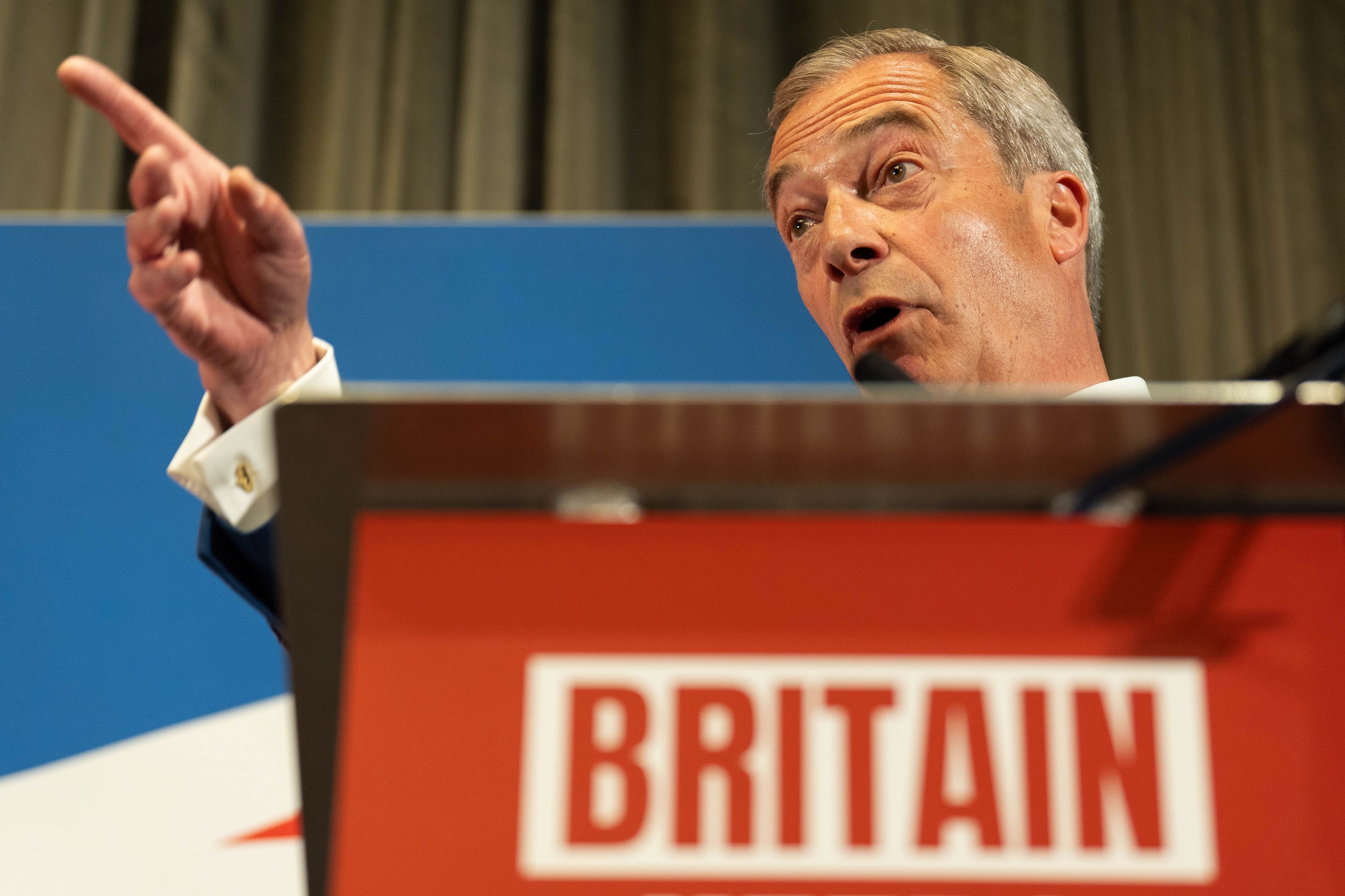 Nigel Farage during a press conference with leader of Reform UK Richard Tice (James Manning/PA)