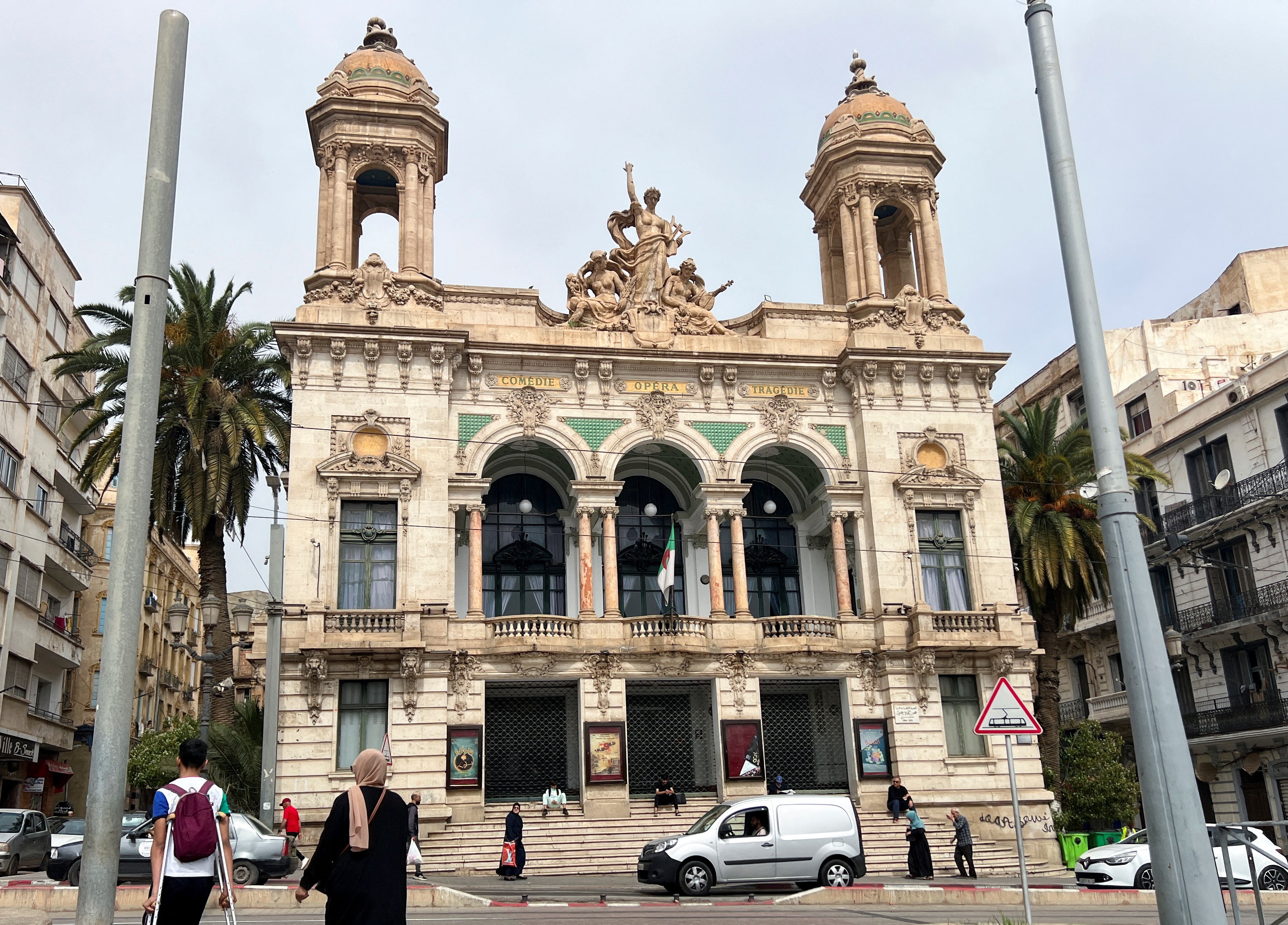 People walk near the Regional Theater of Oran