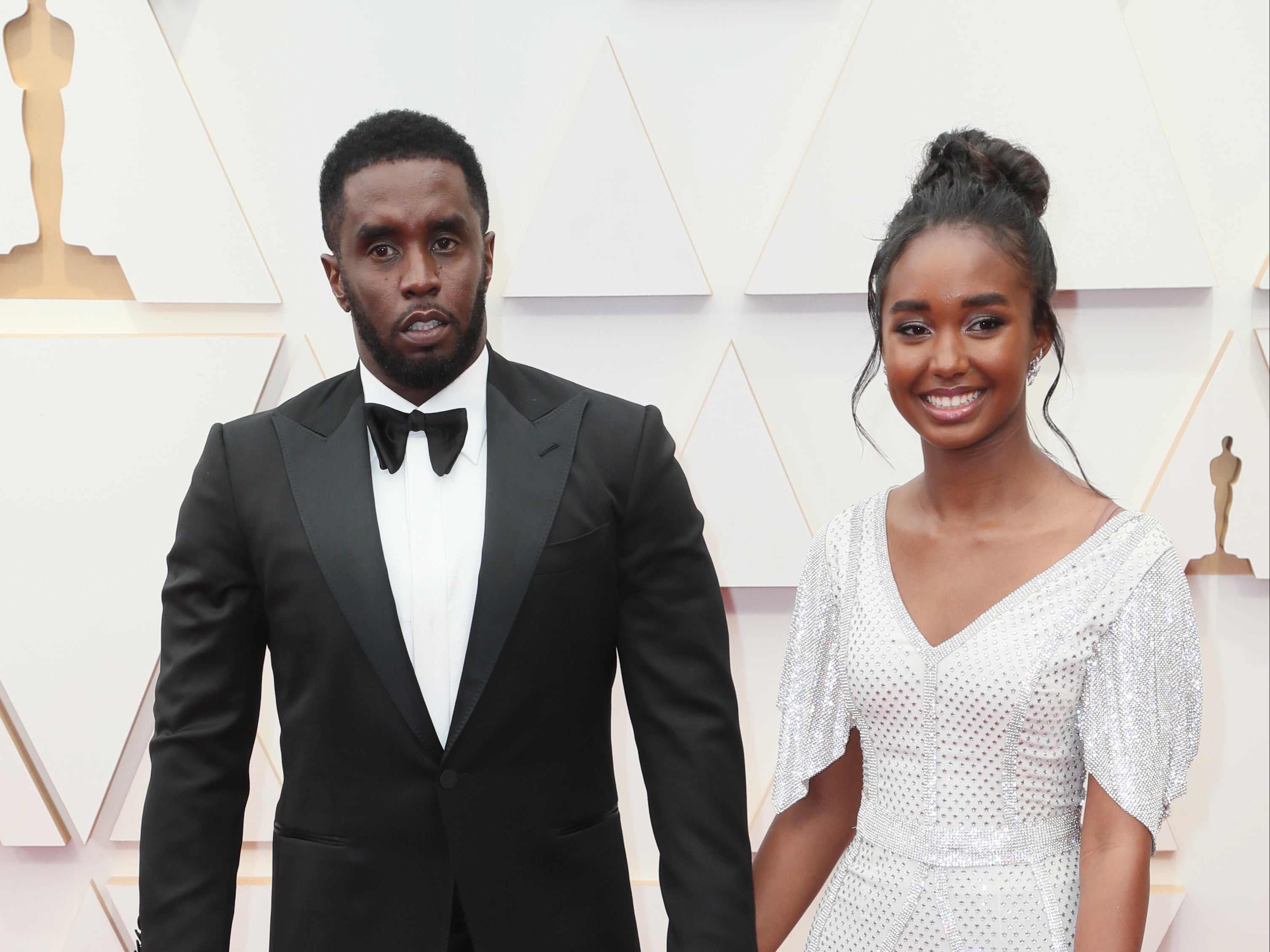 Sean Combs (left) and his daughter Chance at the Oscars in March 2022. Chance Combs, 18, posted photos on Instagram on Sunday showing her holding her diploma while wearing a graduation cap and gown, but her father was nowhere in sight.