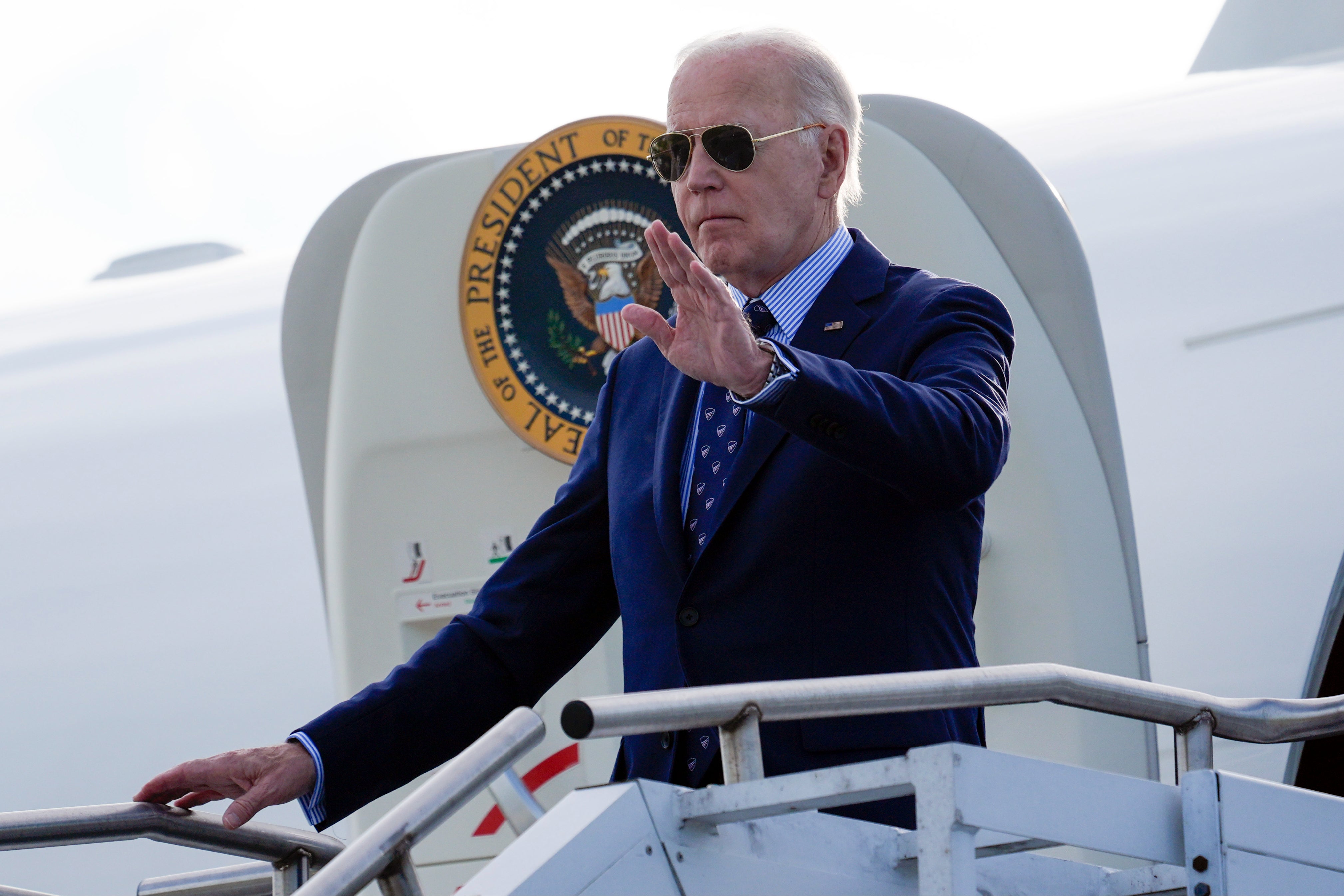 President Joe Biden waves as he arrives on Air Force One at Westchester County Airport in White Plains, New York, on Monday 3 June 2024